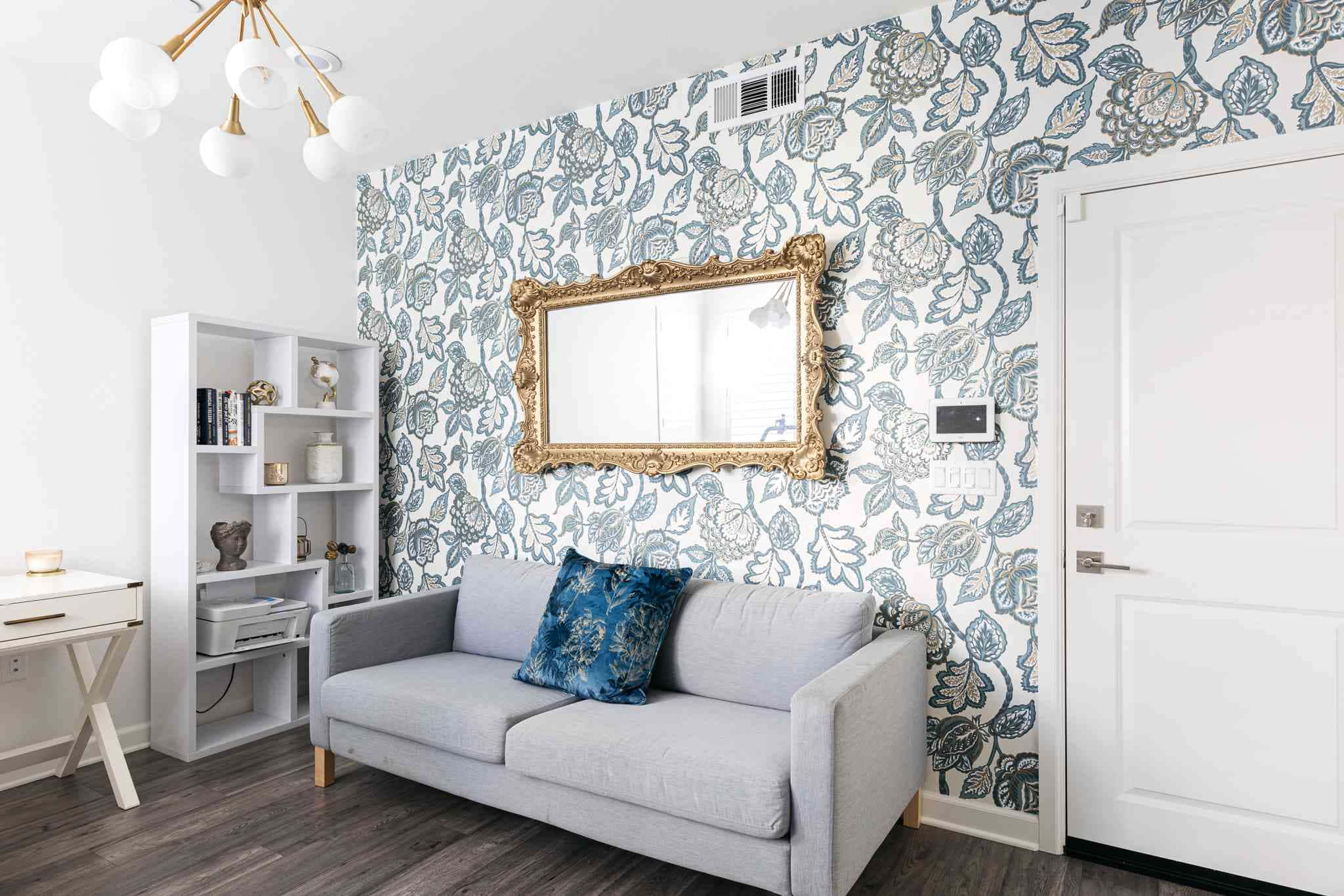 gray sofa, blue and white floral wallpaper, gold-framed mirror, Full HD Desktop Wallpaper