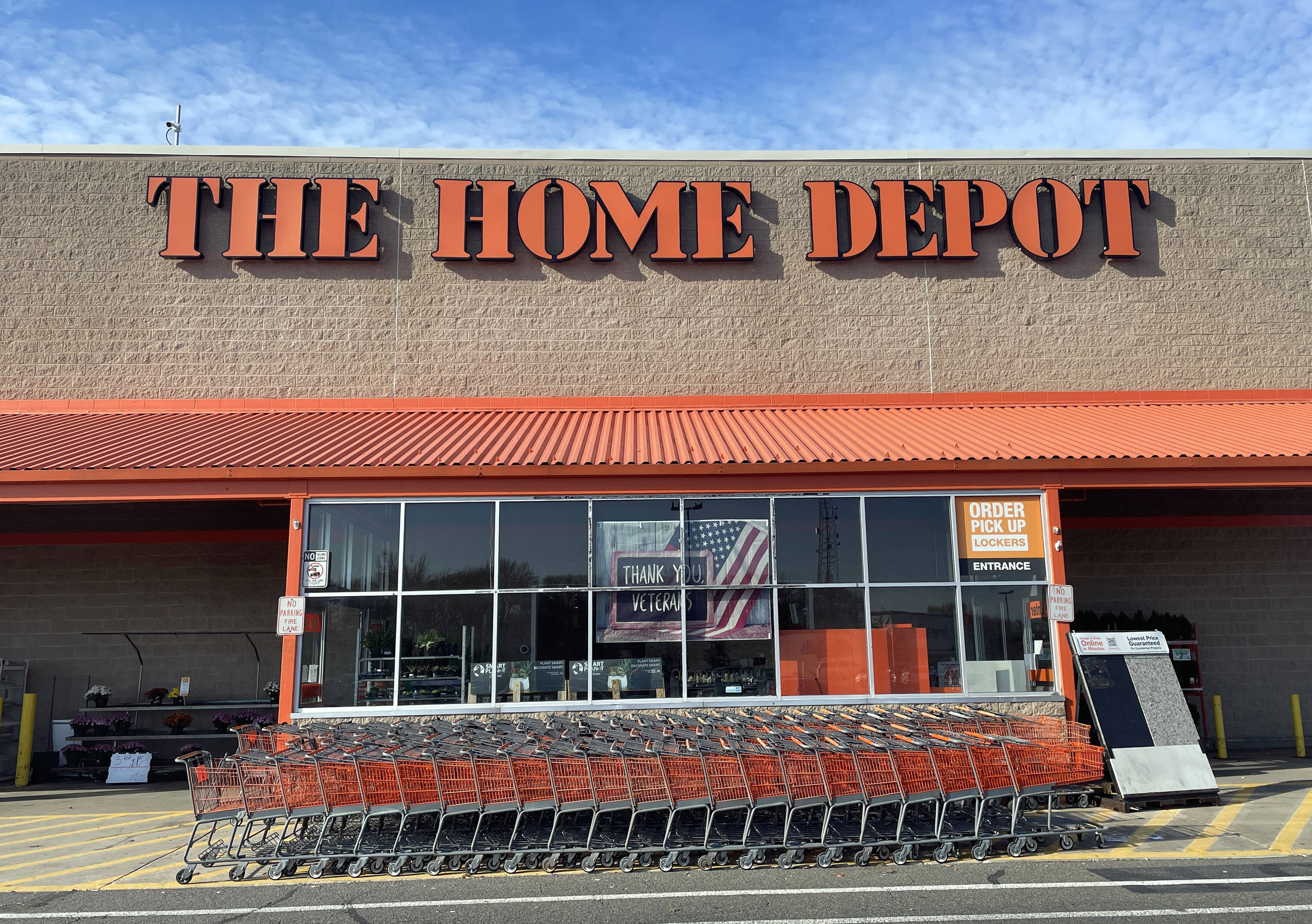 Home Depot, orange shopping carts, bright blue sky, 2K Desktop Wallpaper