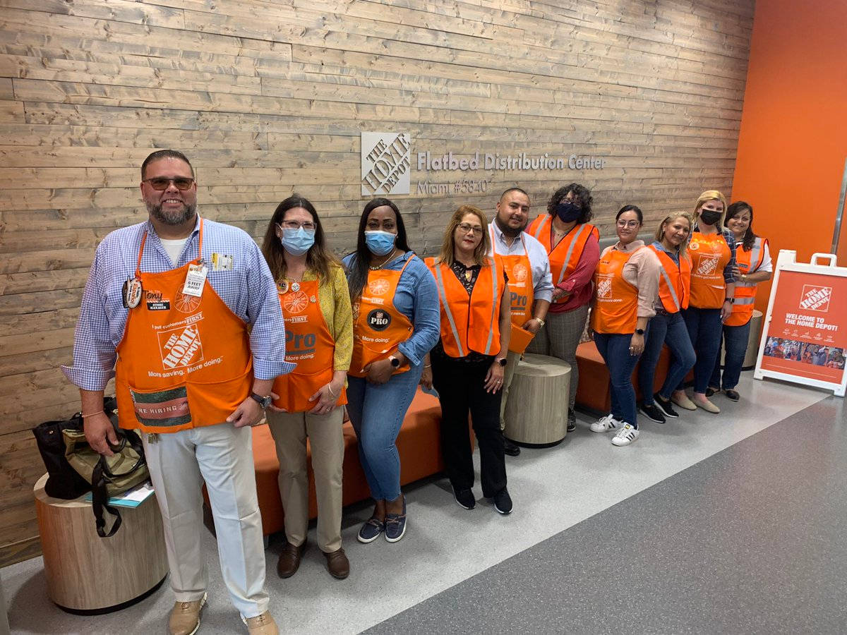 Home Depot, orange aprons, modern wooden-walled distribution center lobby, SD Desktop Wallpaper
