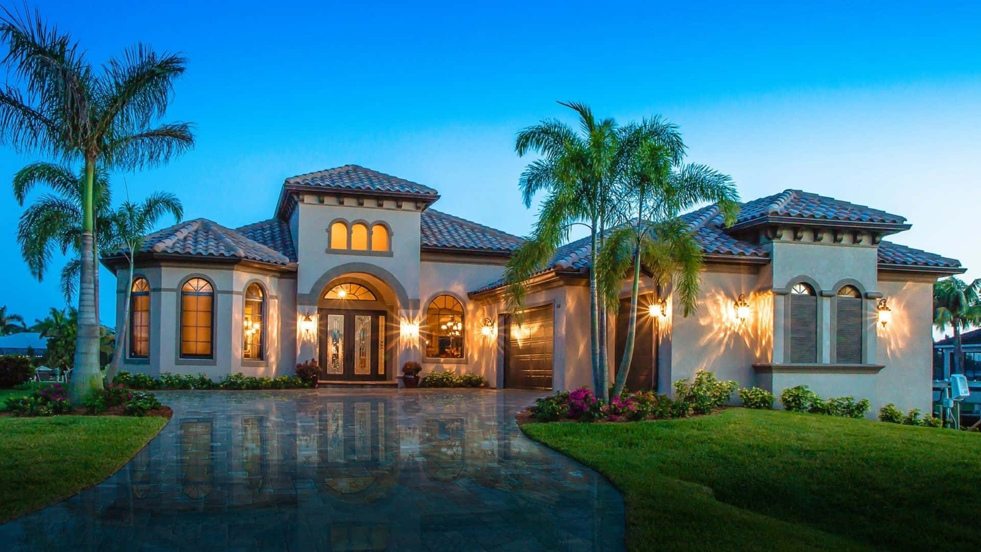 Mediterranean-style mansion, palm trees, warm glowing lights, Full HD Desktop Wallpaper