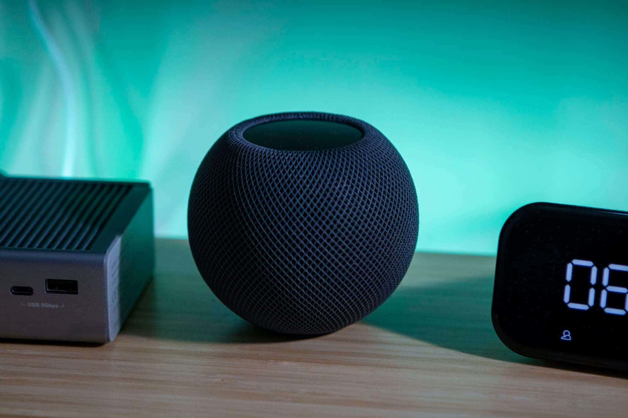 Black Homepod, wooden desk, digital clock, Full HD Desktop Wallpaper