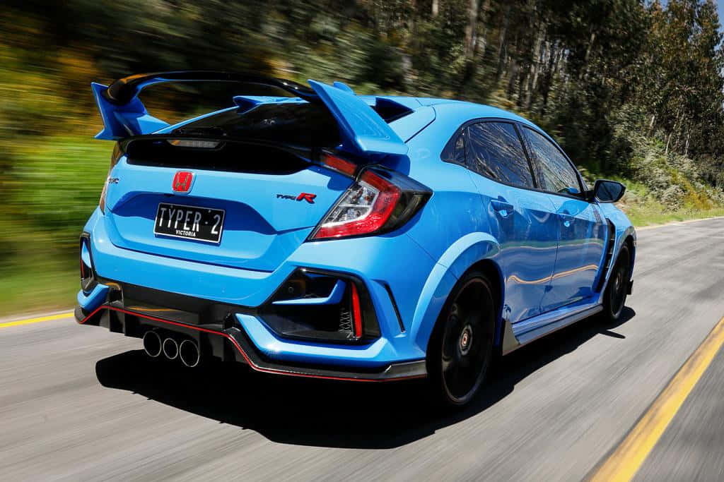 Honda Civic Type R, vibrant blue, forest-lined road, SD Desktop Wallpaper