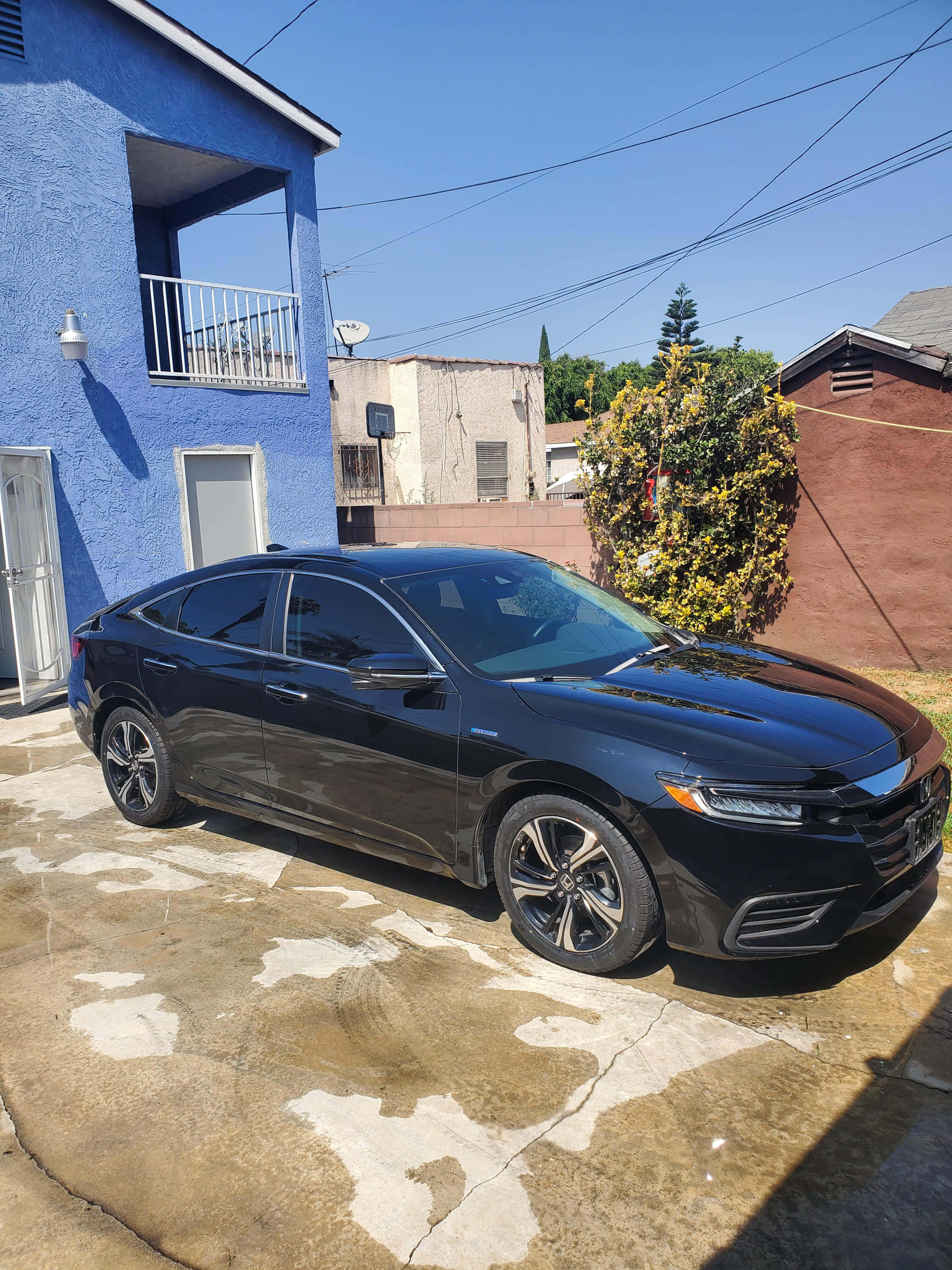 Honda Insight, black sedan, sunlit concrete driveway, 4K Phone Wallpaper