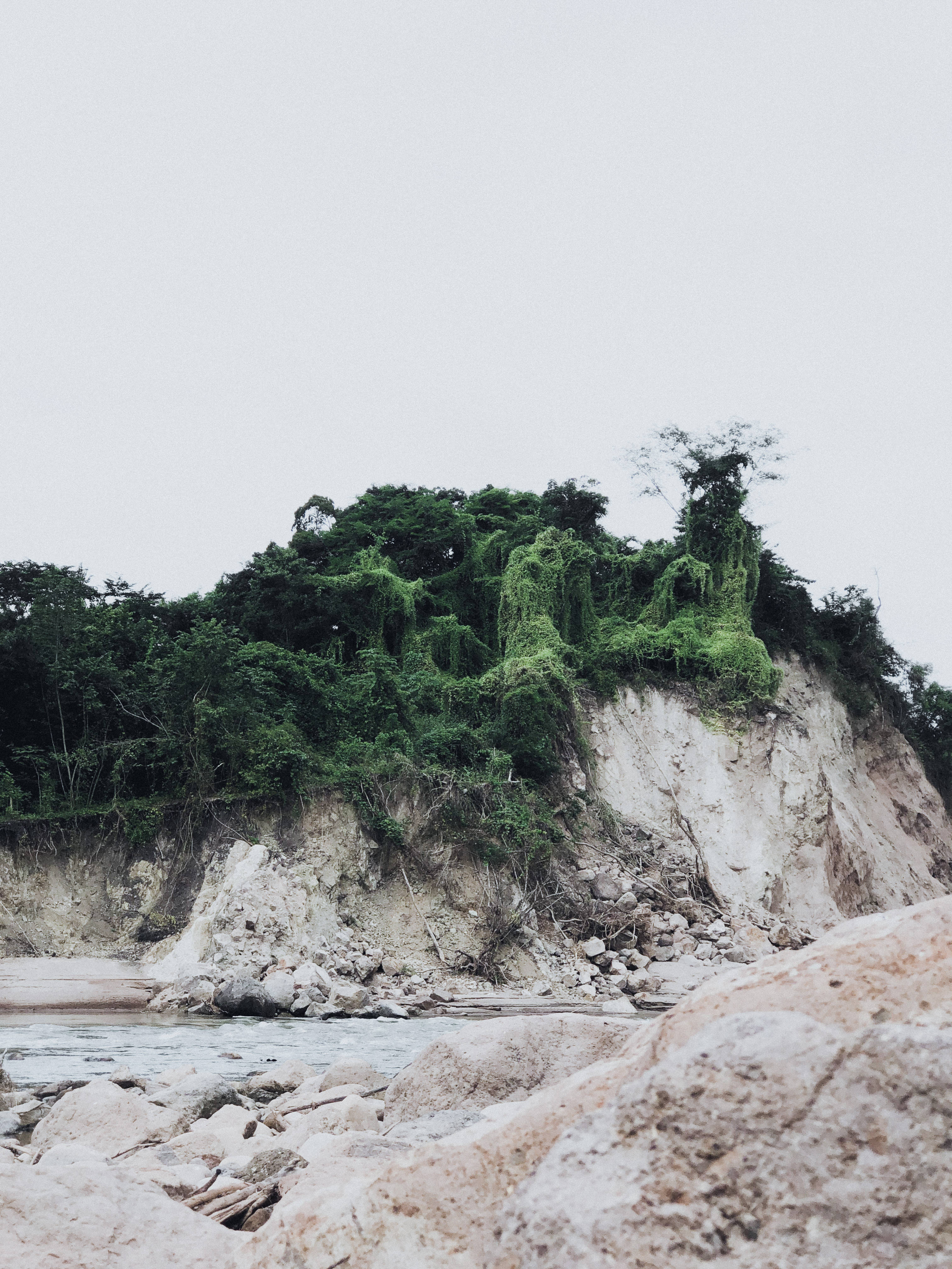 Honduras, limestone rock, mossy cliffside, 4K Phone Wallpaper