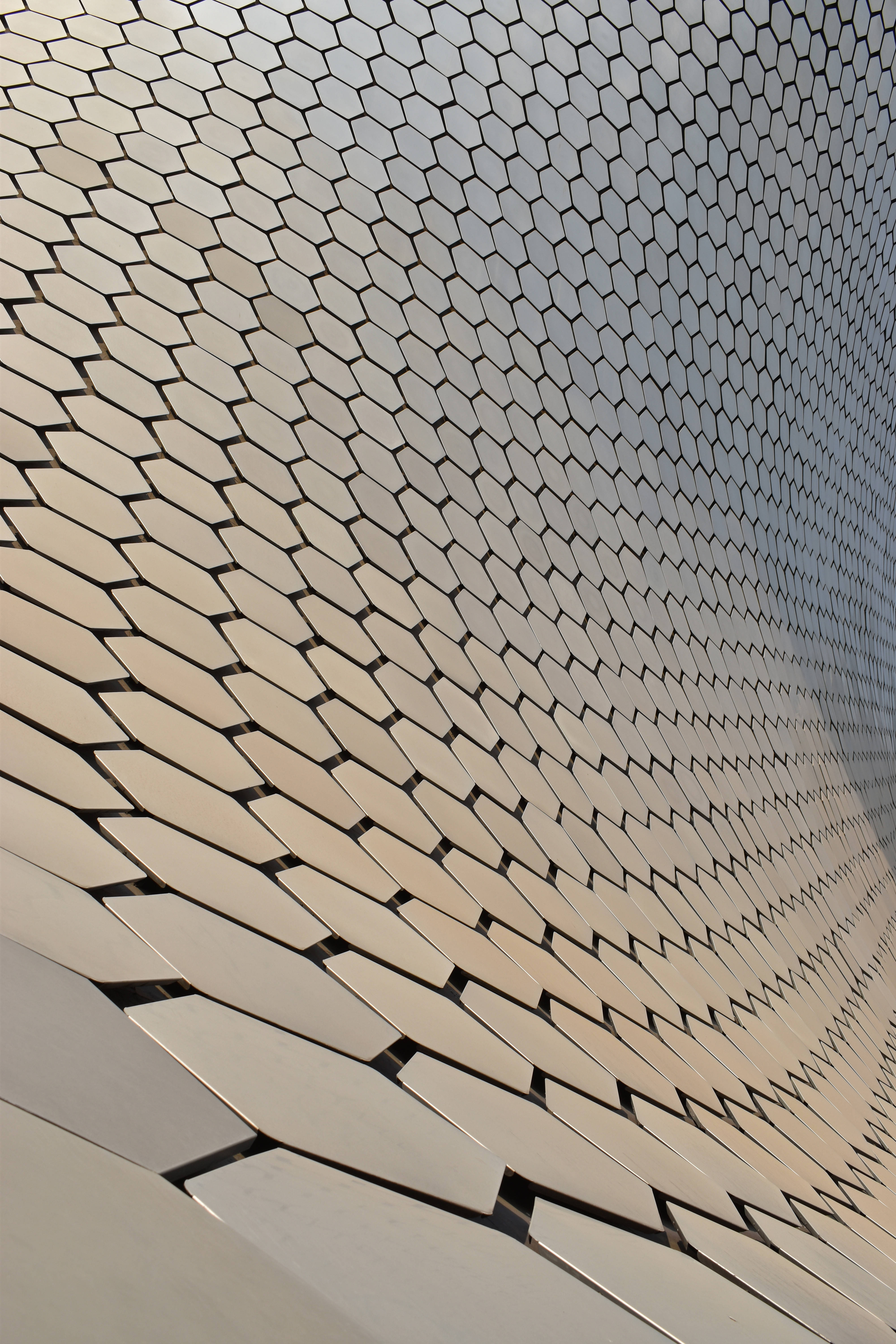 Steel Hexagon Wave, curved metallic hexagonal panel facade, modern building, 5K Phone Wallpaper