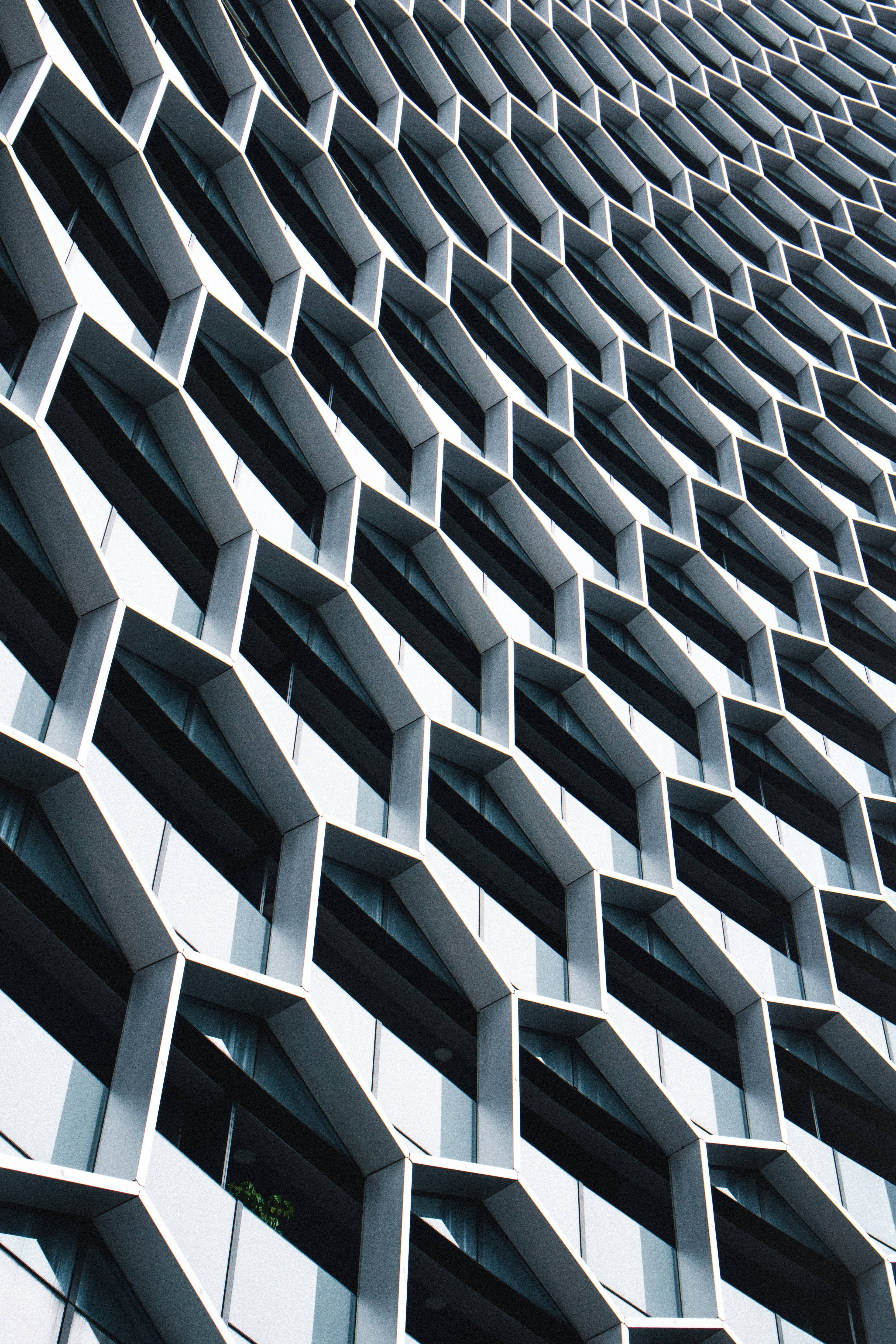 honeycomb window panes, hexagonal grid pattern, modern building, 5K Phone Wallpaper