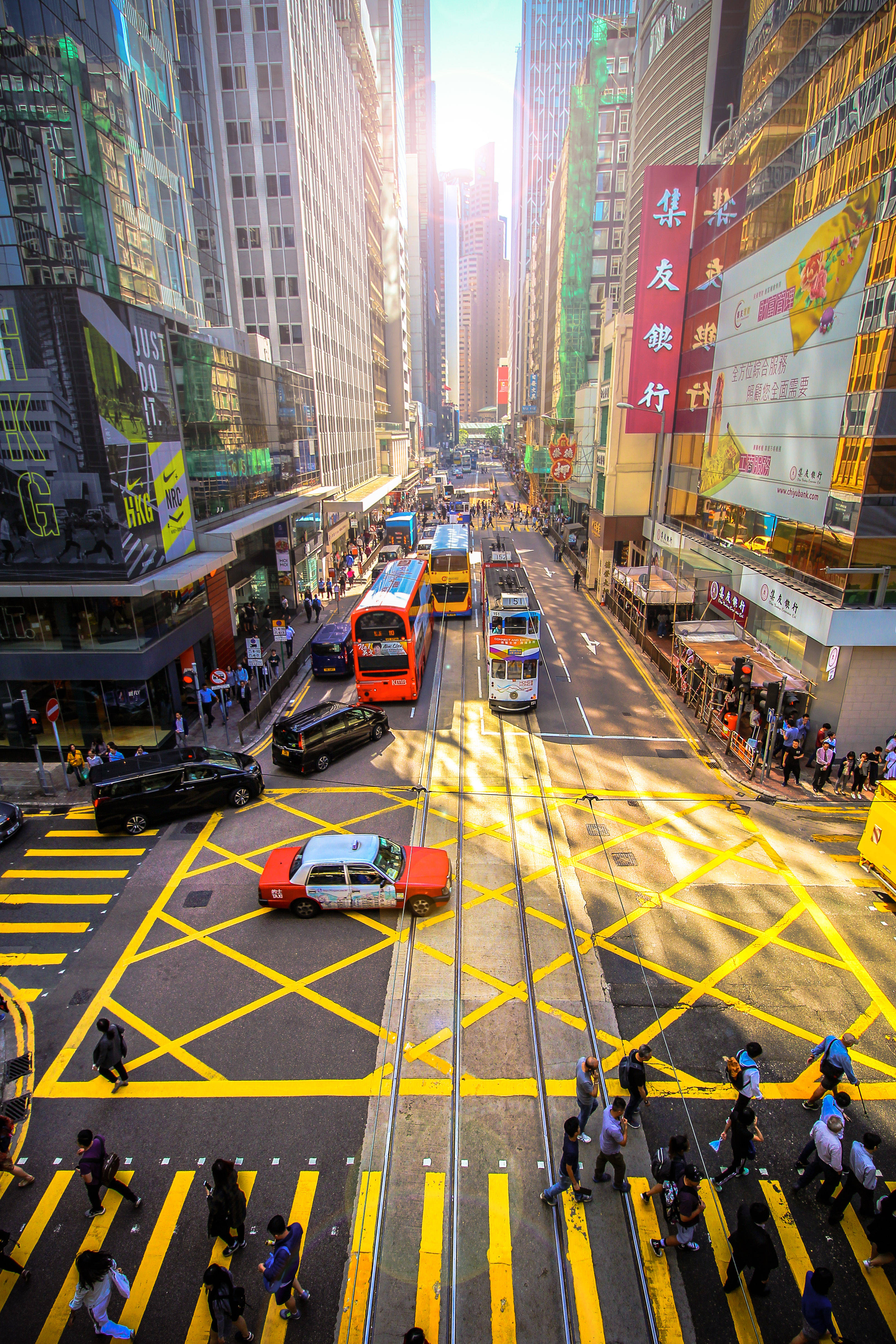 Hong Kong, yellow markings, sunlight, 4K Phone Wallpaper