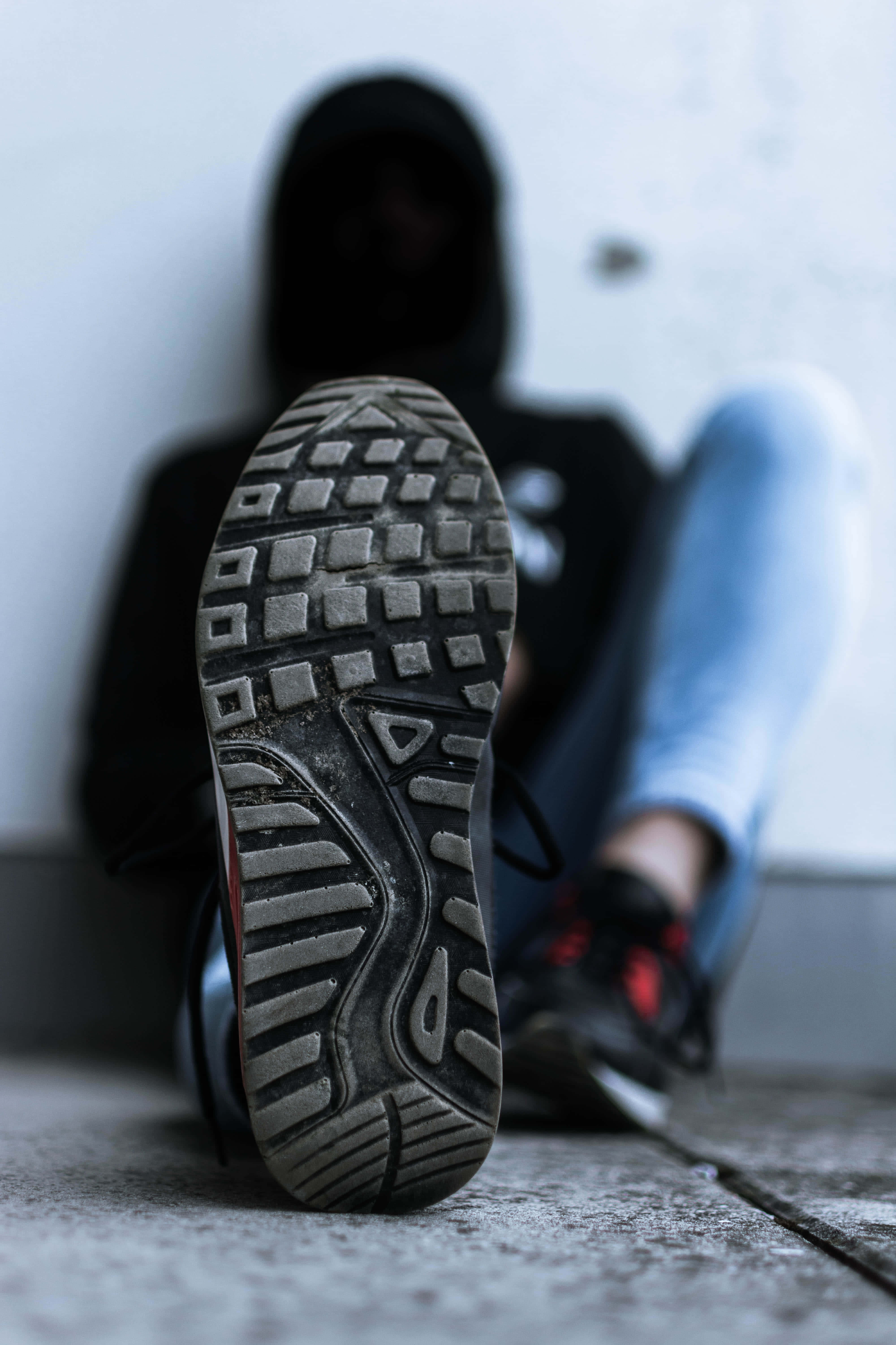 sneaker sole, black hoodie, concrete floor, 5K Phone Wallpaper