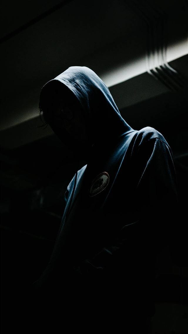hooded figure, single beam of light, shoulder, SD Phone Wallpaper