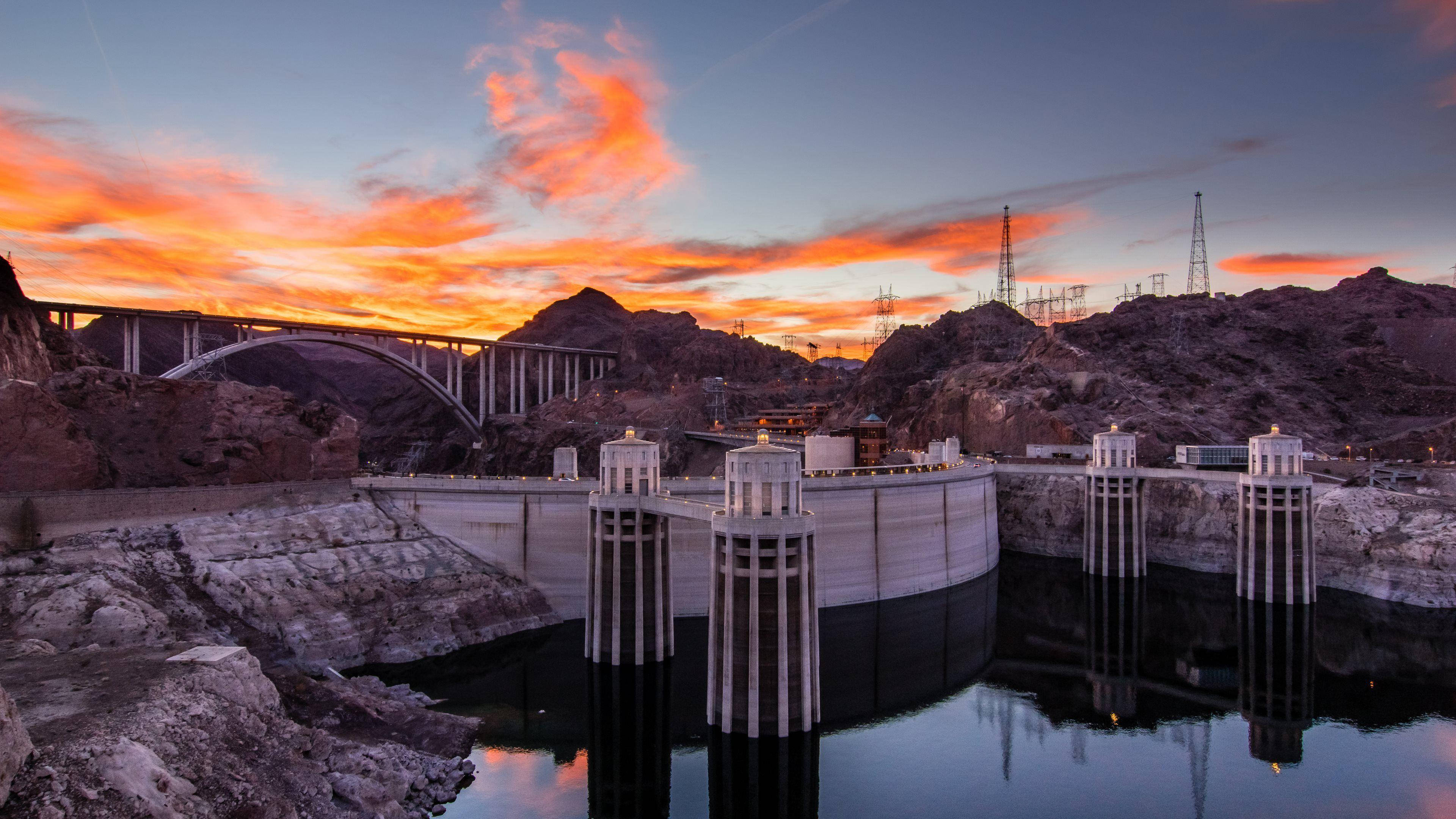 Hoover Dam, sunset sky, fiery orange clouds, 4K Desktop Wallpaper