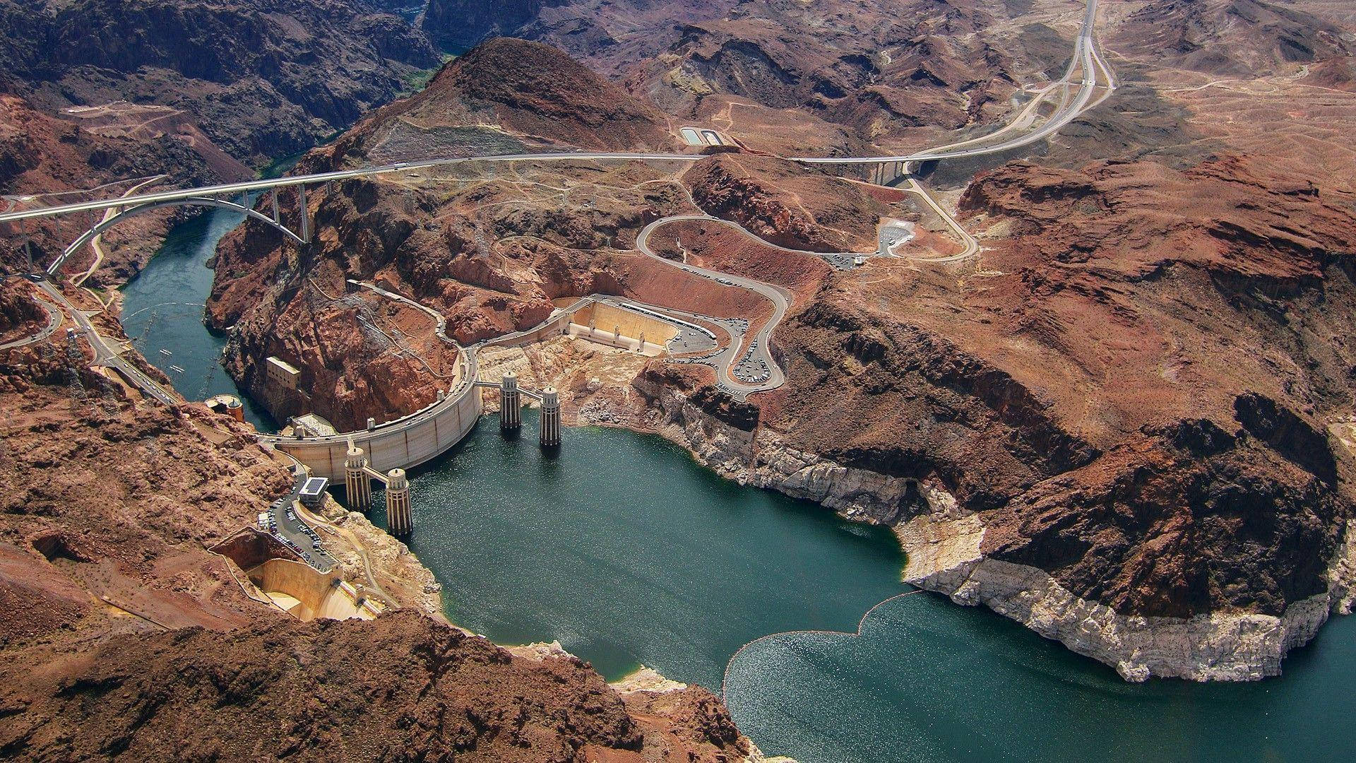 Hoover Dam, rugged red rock canyons, winding roads, Full HD Desktop Wallpaper