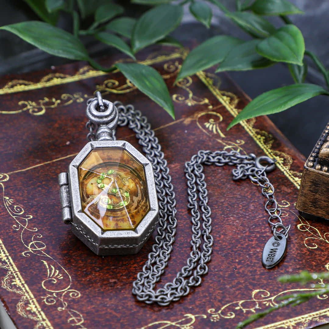 Horcrux, antique silver pocket watch, green vine design, SD Desktop Wallpaper