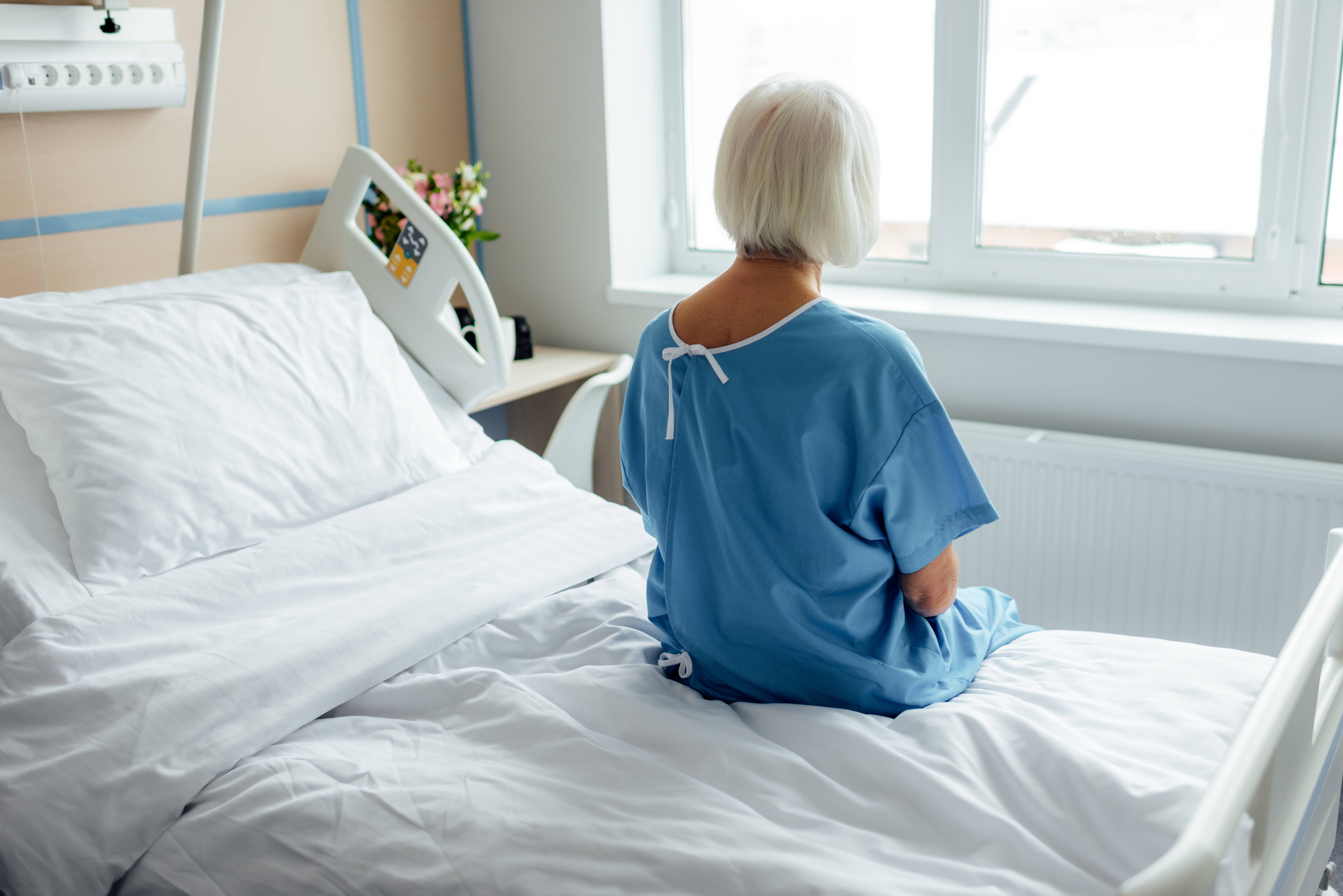 female patient, hospital bed, blue hospital gown, 5K Desktop Wallpaper