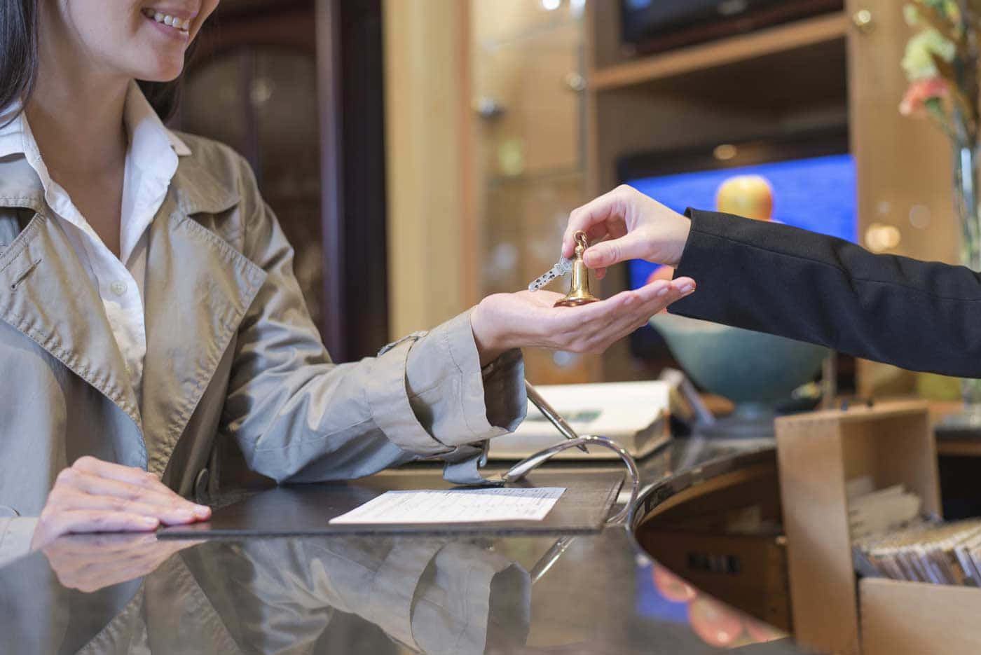 golden hotel key, polished reception desk, smiling guest, HD Desktop Wallpaper