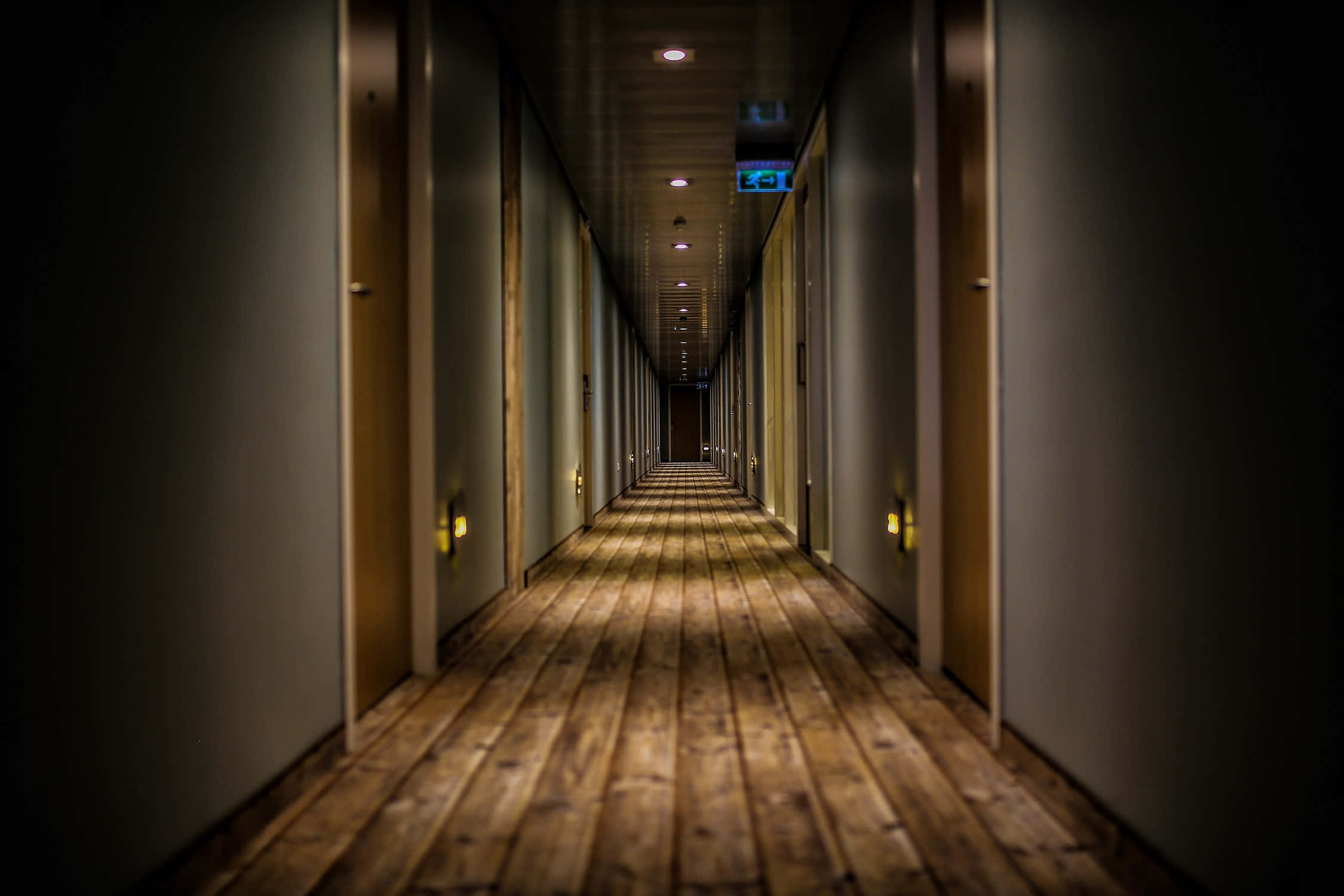 hotel corridor, wooden floors, doors receding into darkness, Full HD Desktop Wallpaper