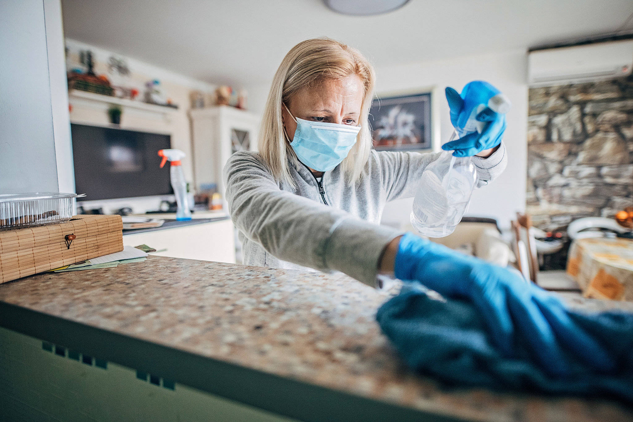 housekeeper cleaning wipe dust face mask, blue gloves, speckled kitchen countertop, Full HD Desktop Wallpaper