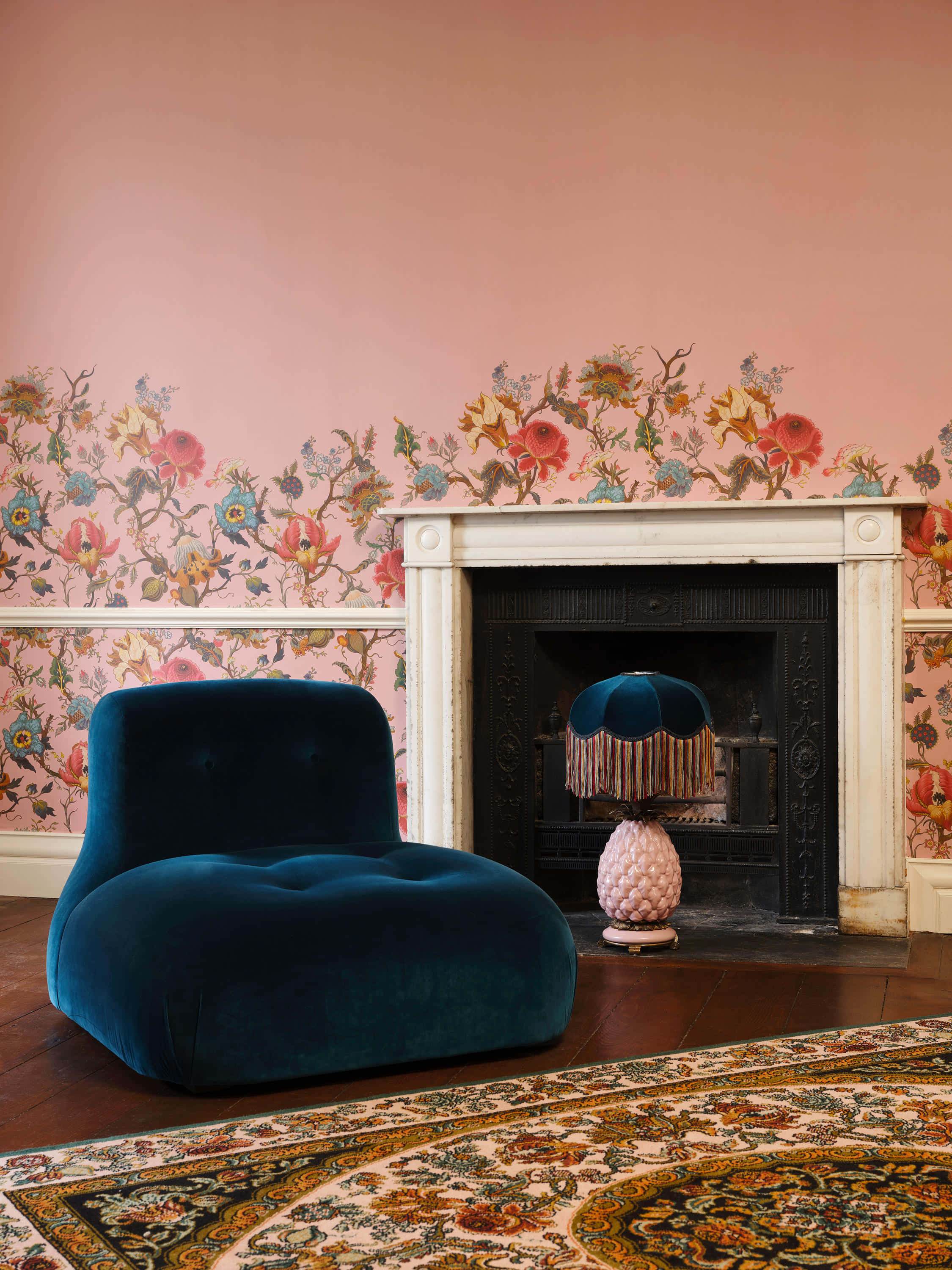 teal velvet chair, fireplace, pink wall, 2K Phone Wallpaper
