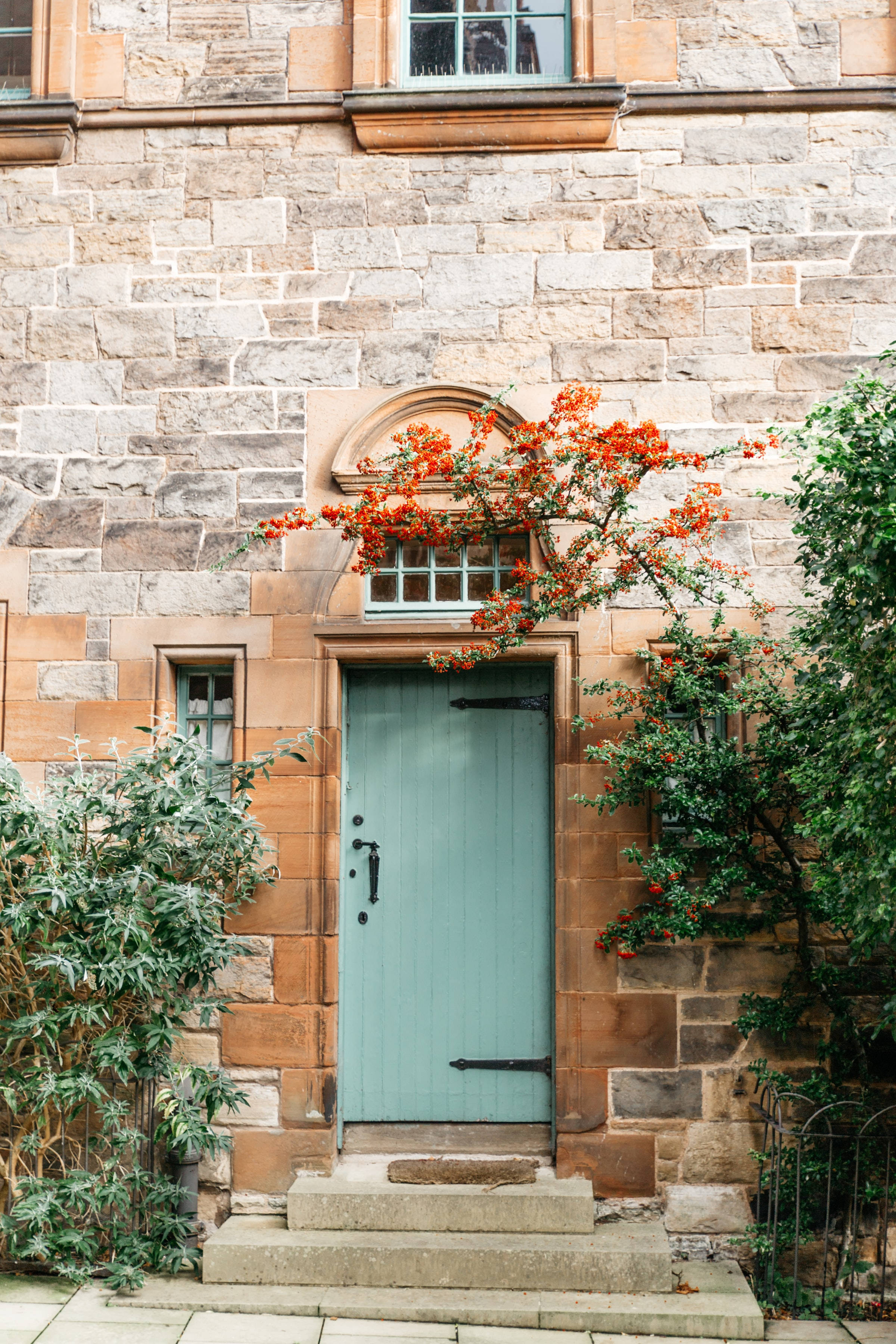 old house, blue green wooden door, rustic stone walls, 2K Phone Wallpaper
