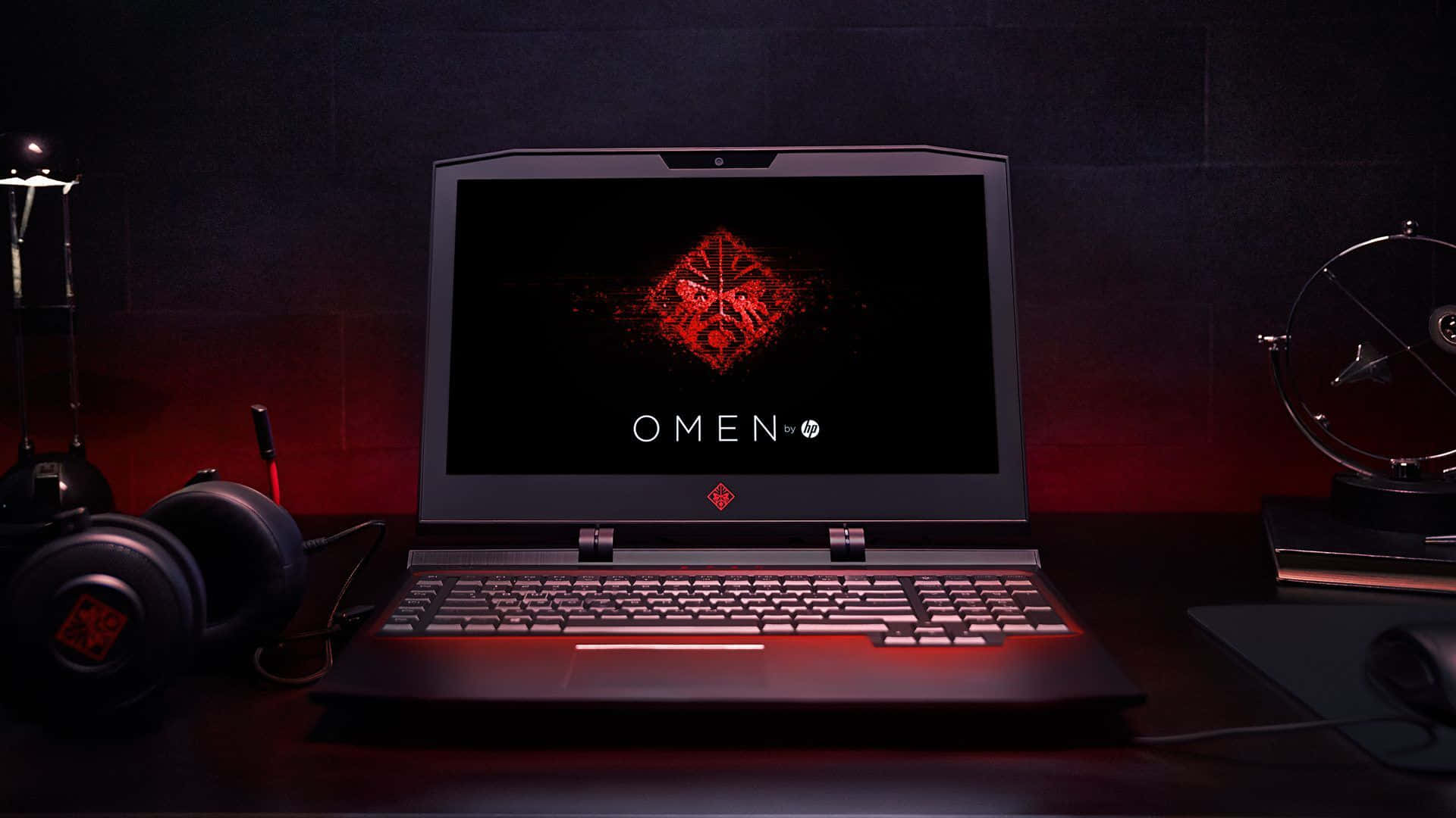 HP Omen, sleek black gaming laptop, glowing red accents, Full HD Desktop Wallpaper