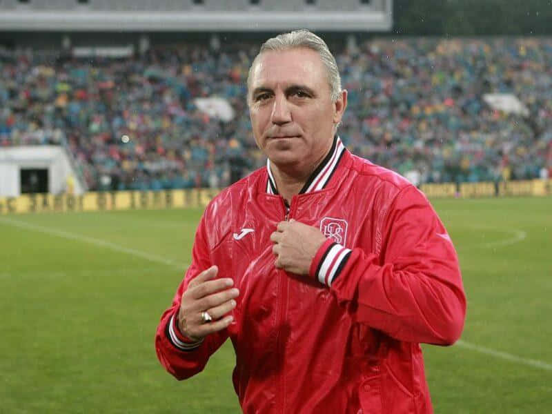 Hristo Stoichkov, red jacket, rain-slicked soccer field, SD Desktop Wallpaper