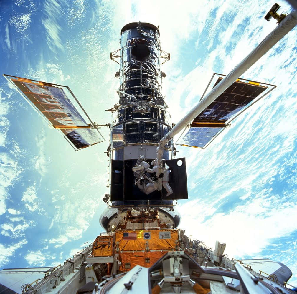 Hubble Space Telescope, Earth, swirling blue and white clouds, SD Desktop Wallpaper
