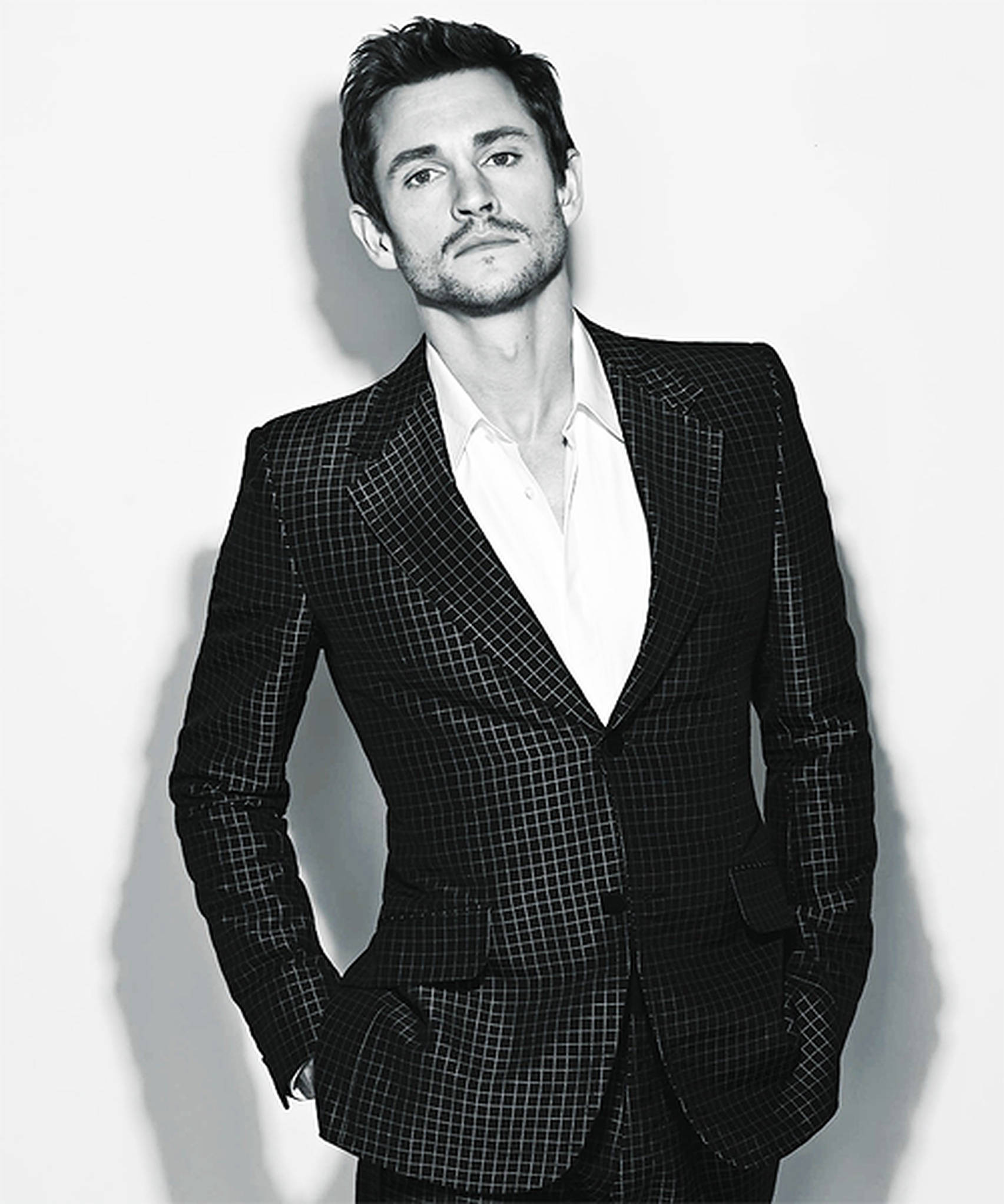 Hugh Dancy, checkered suit, plain wall, Full HD Phone Wallpaper