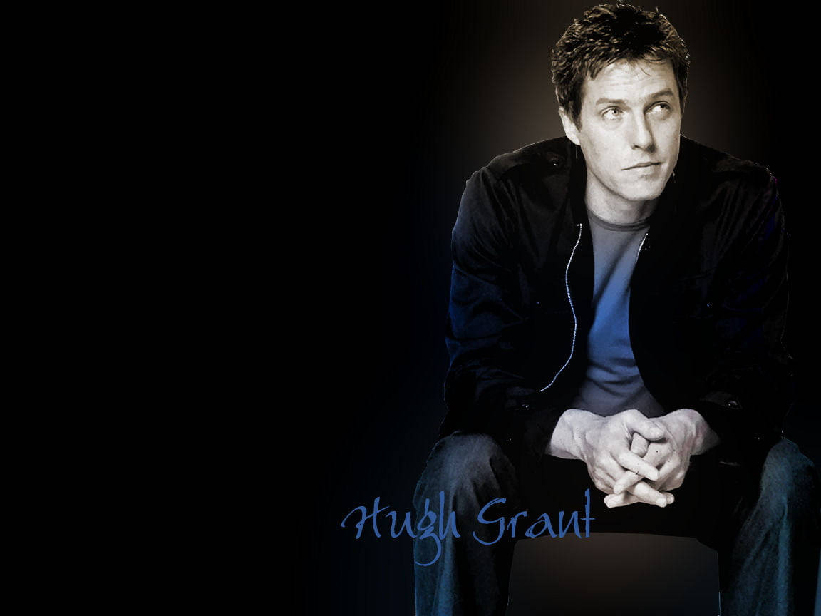 Hugh Grant, black background, dim light, SD Desktop Wallpaper