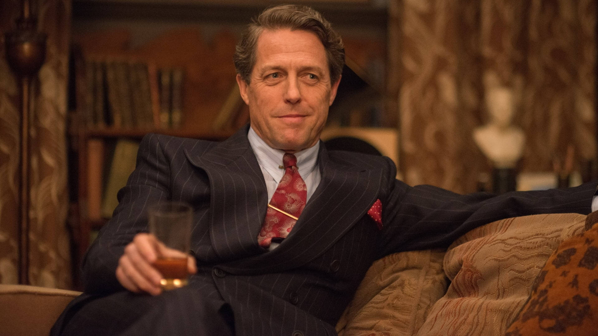 Hugh Grant, pinstripe suit, patterned couch, Full HD Desktop Wallpaper