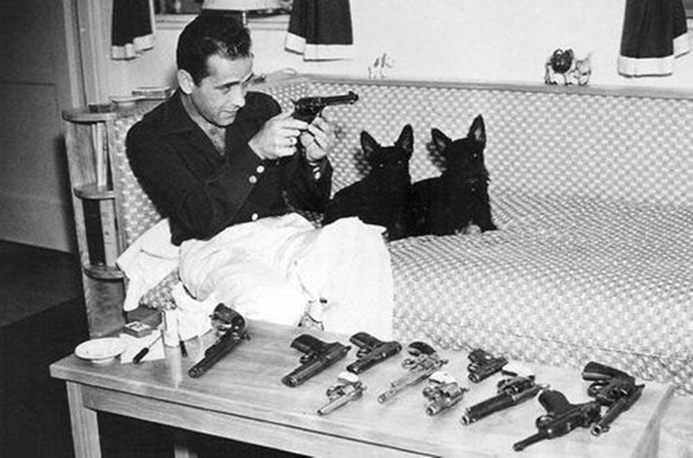 Humphrey Bogart, pistol, eight other handguns, SD Desktop Wallpaper
