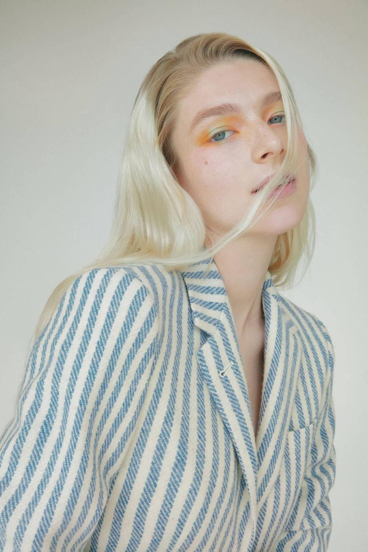 Hunter Schafer, blonde woman, striking orange eyeshadow, HD Phone Wallpaper