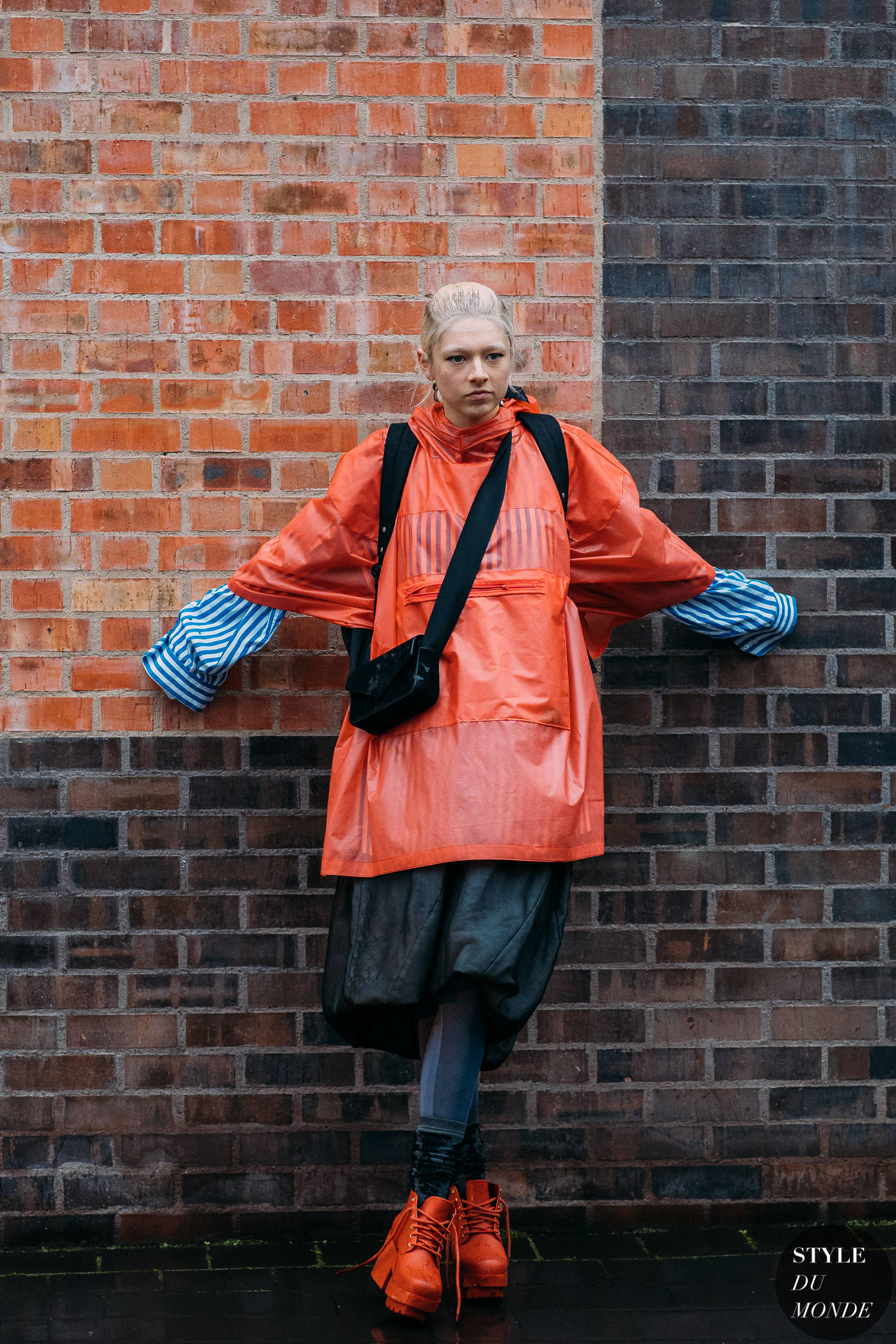 Hunter Schafer, bright orange raincoat, striped sleeves, Full HD Phone Wallpaper