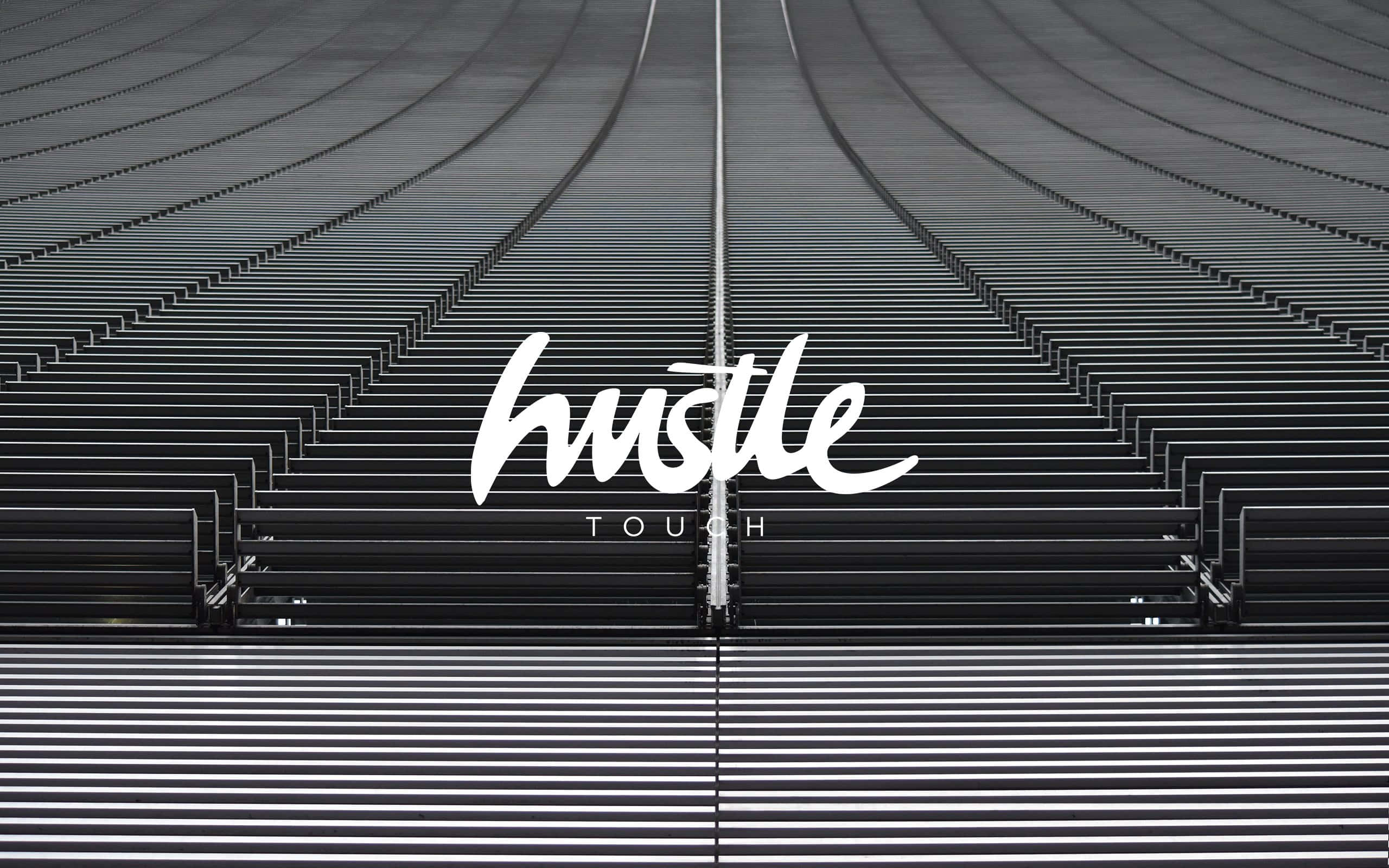 Hustler, black stadium seats, symmetrical rows, 2K Desktop Wallpaper