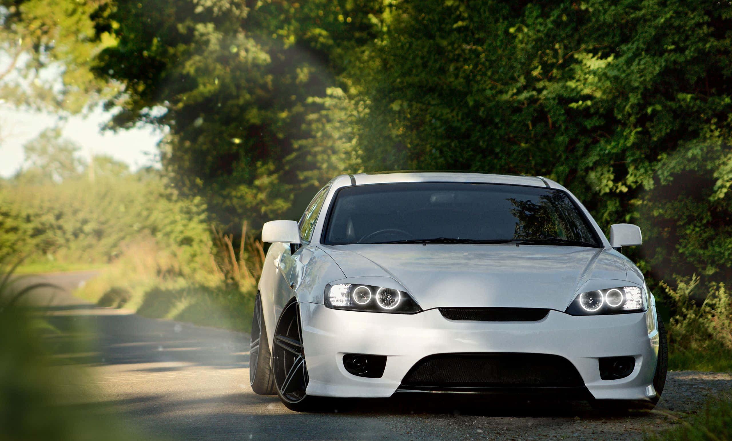 Hyundai Tiburon, white, glowing headlights, 2K Desktop Wallpaper