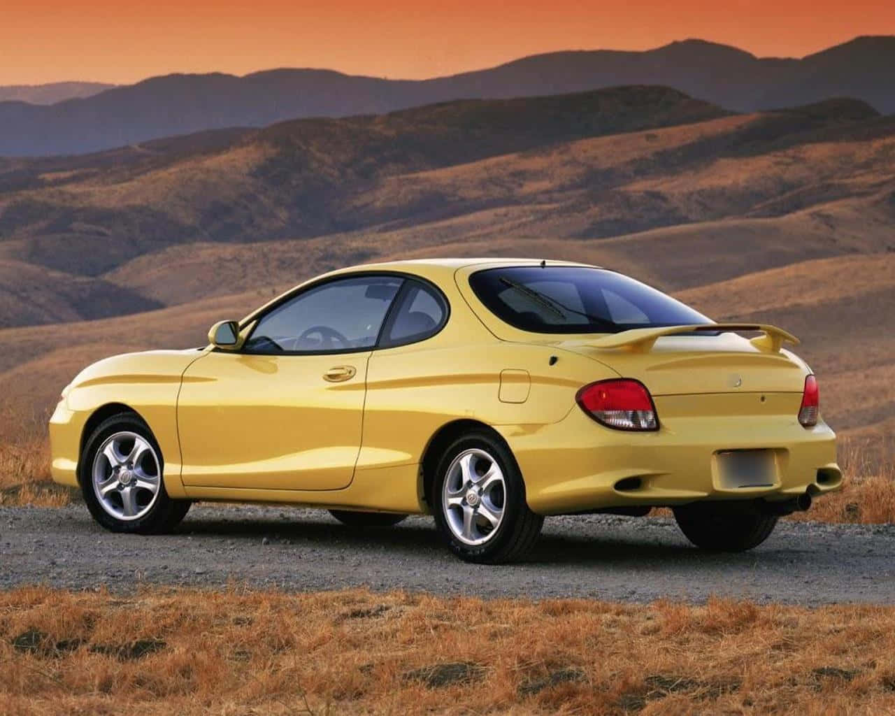 Hyundai Tiburon, vibrant yellow, gravel road, HD Desktop Wallpaper