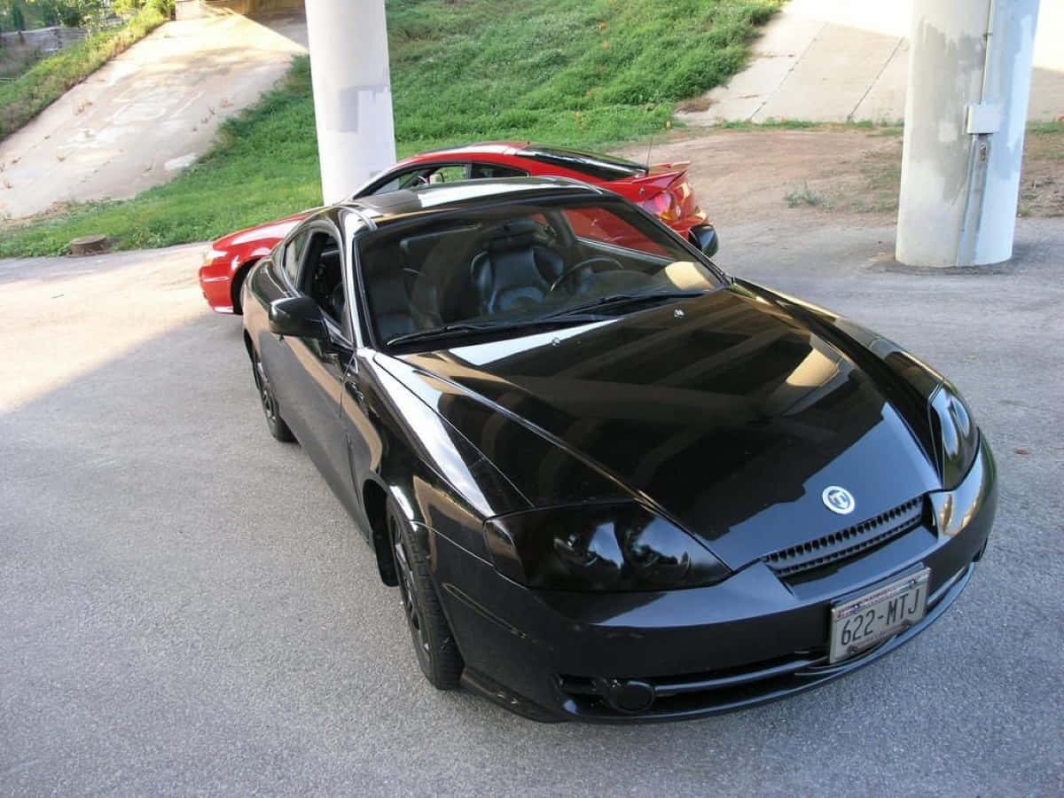 Hyundai Tiburon, black, concrete pillars, SD Desktop Wallpaper