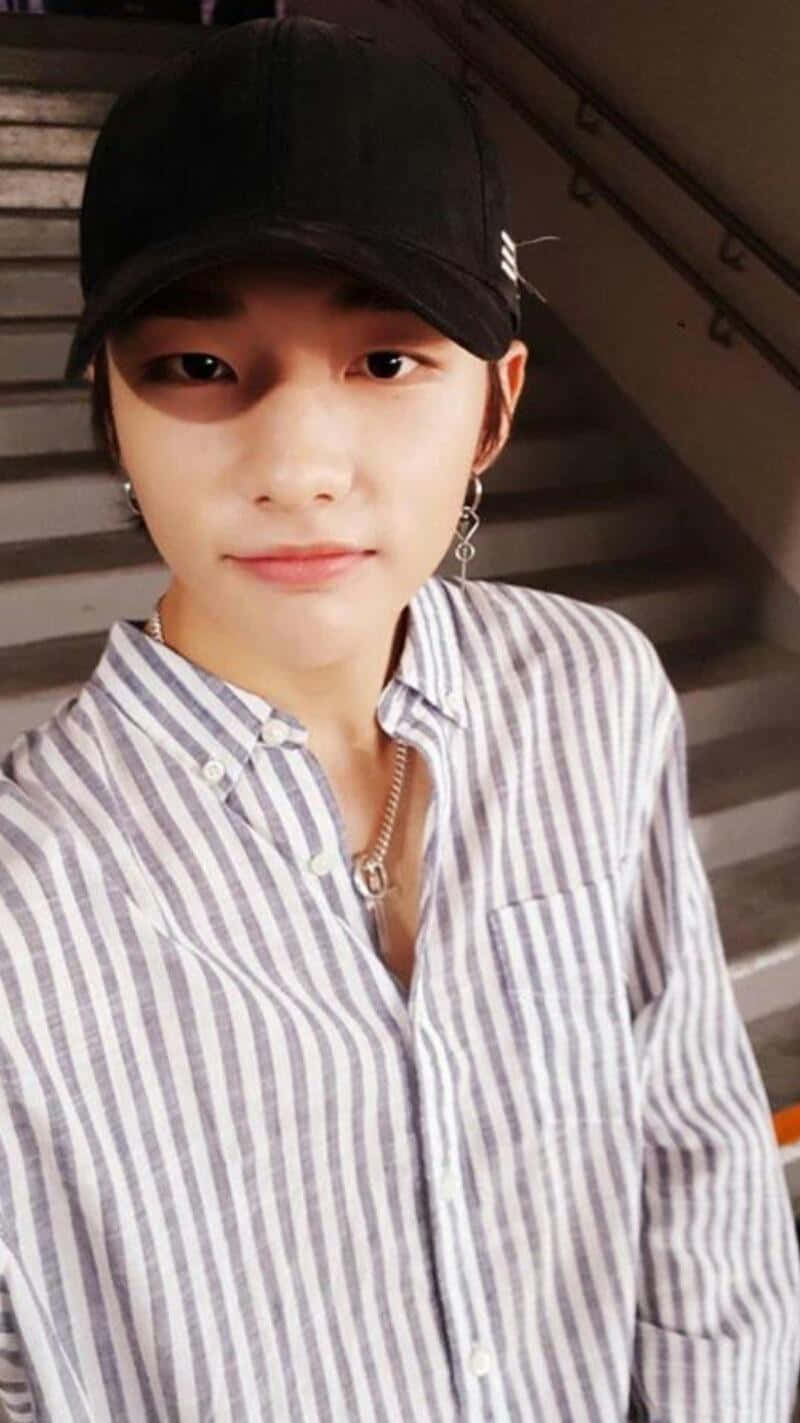 Hyunjin, black cap, striped shirt, HD Phone Wallpaper