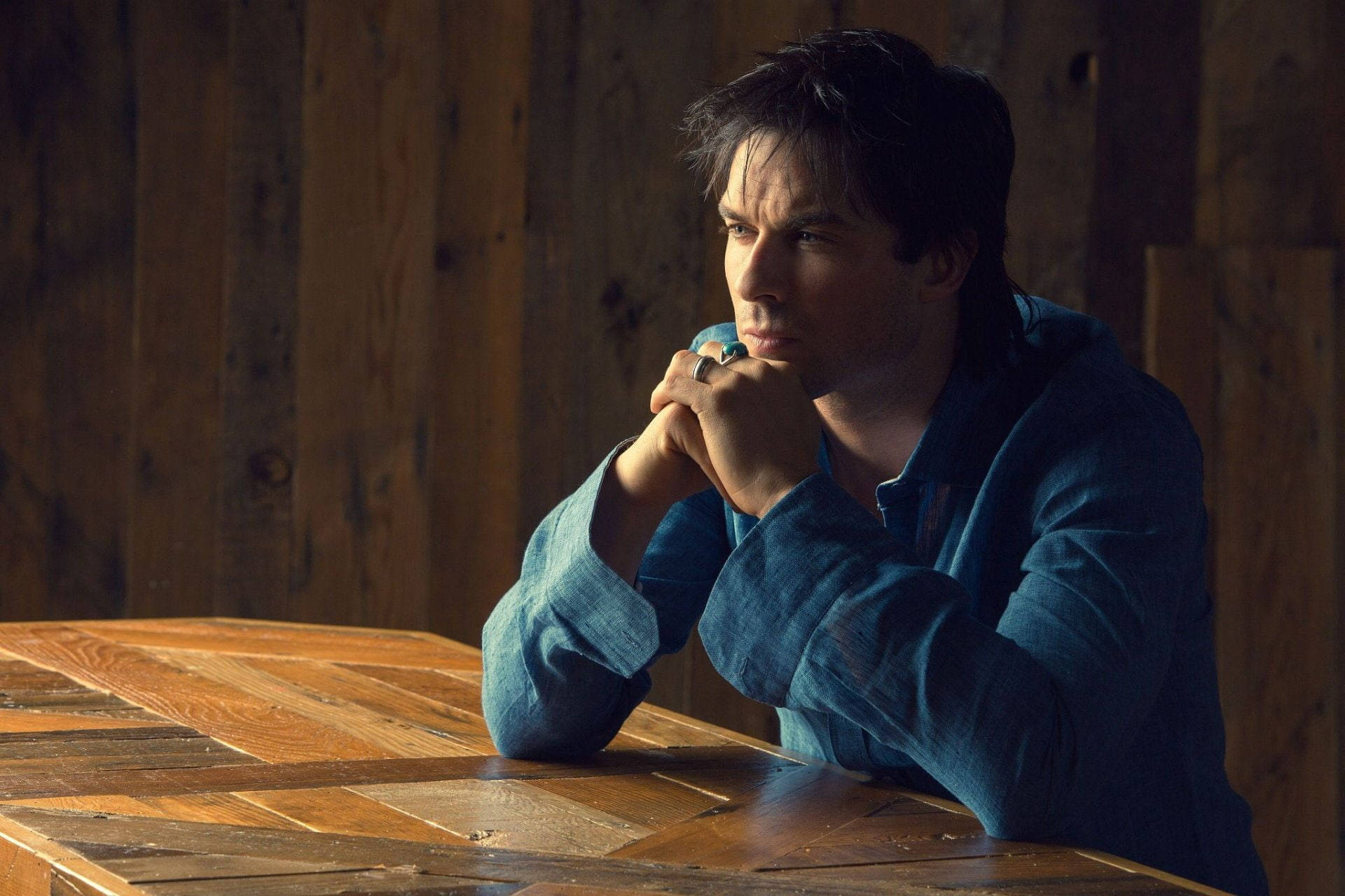 Ian Somerhalder, blue shirt, wooden table, Full HD Desktop Wallpaper
