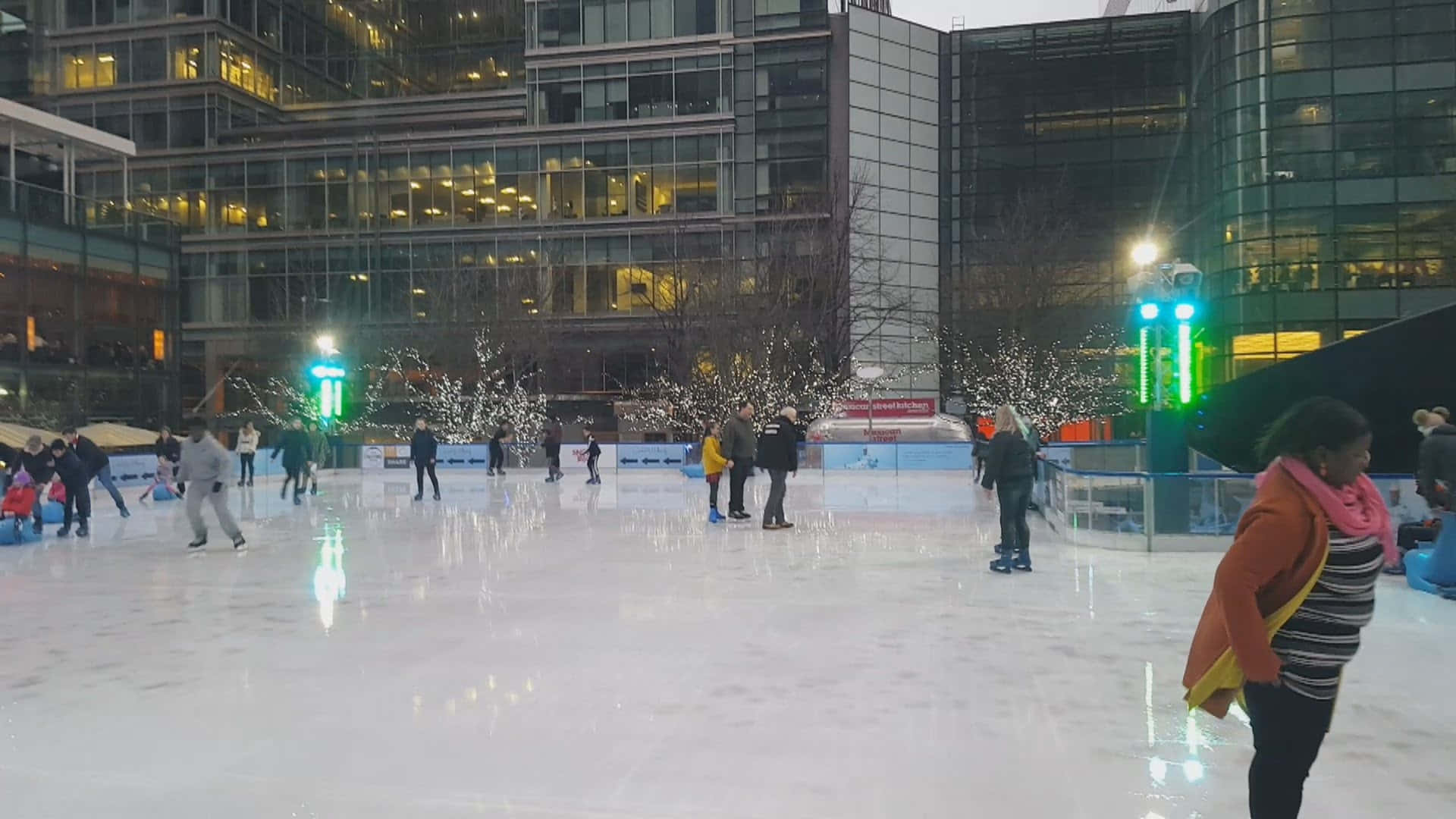 Ice Rink, Twinkling Lights, Modern Glass Buildings, Full HD Desktop Wallpaper