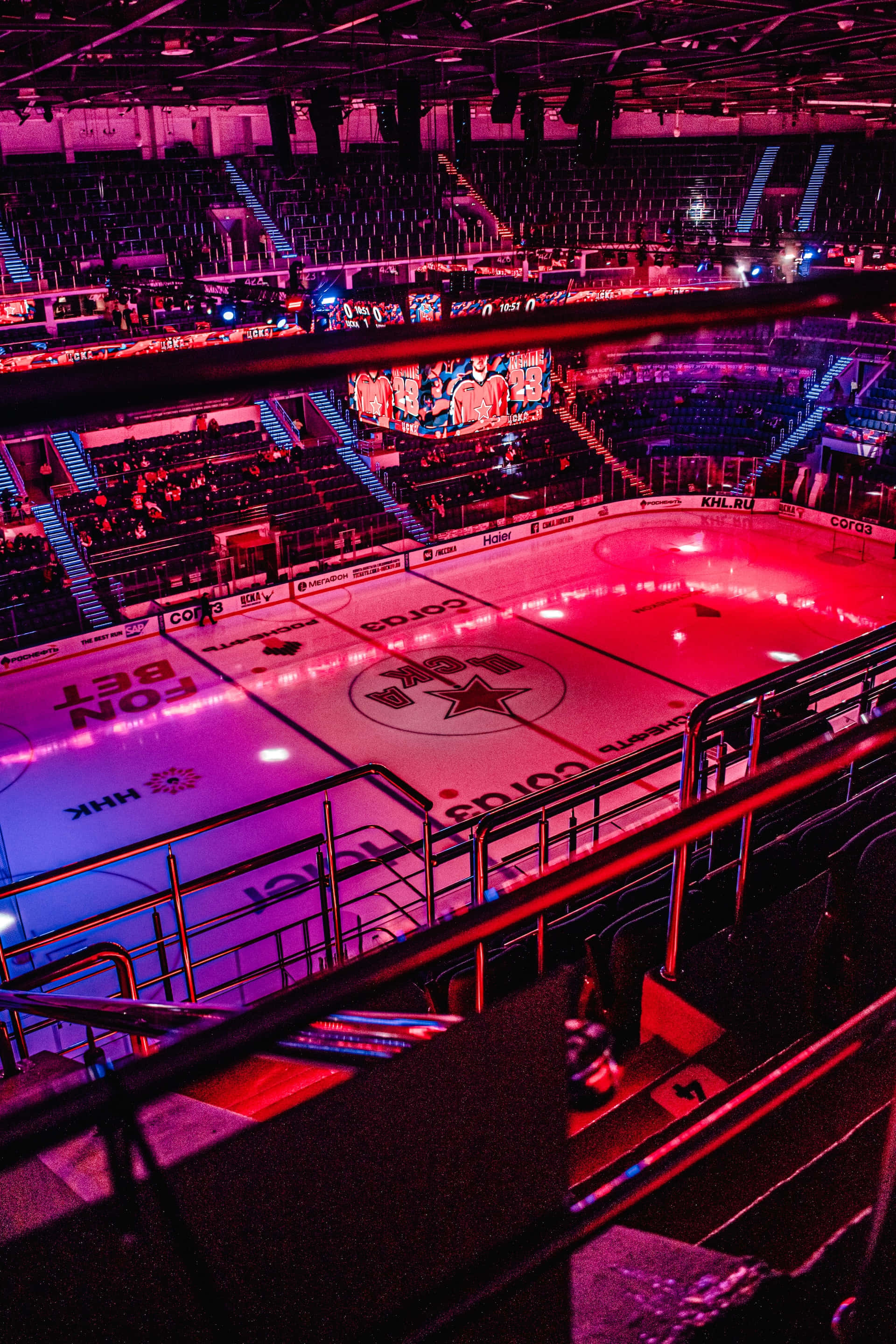ice rink, electric pink and blue lights, dark arena, 2K Phone Wallpaper