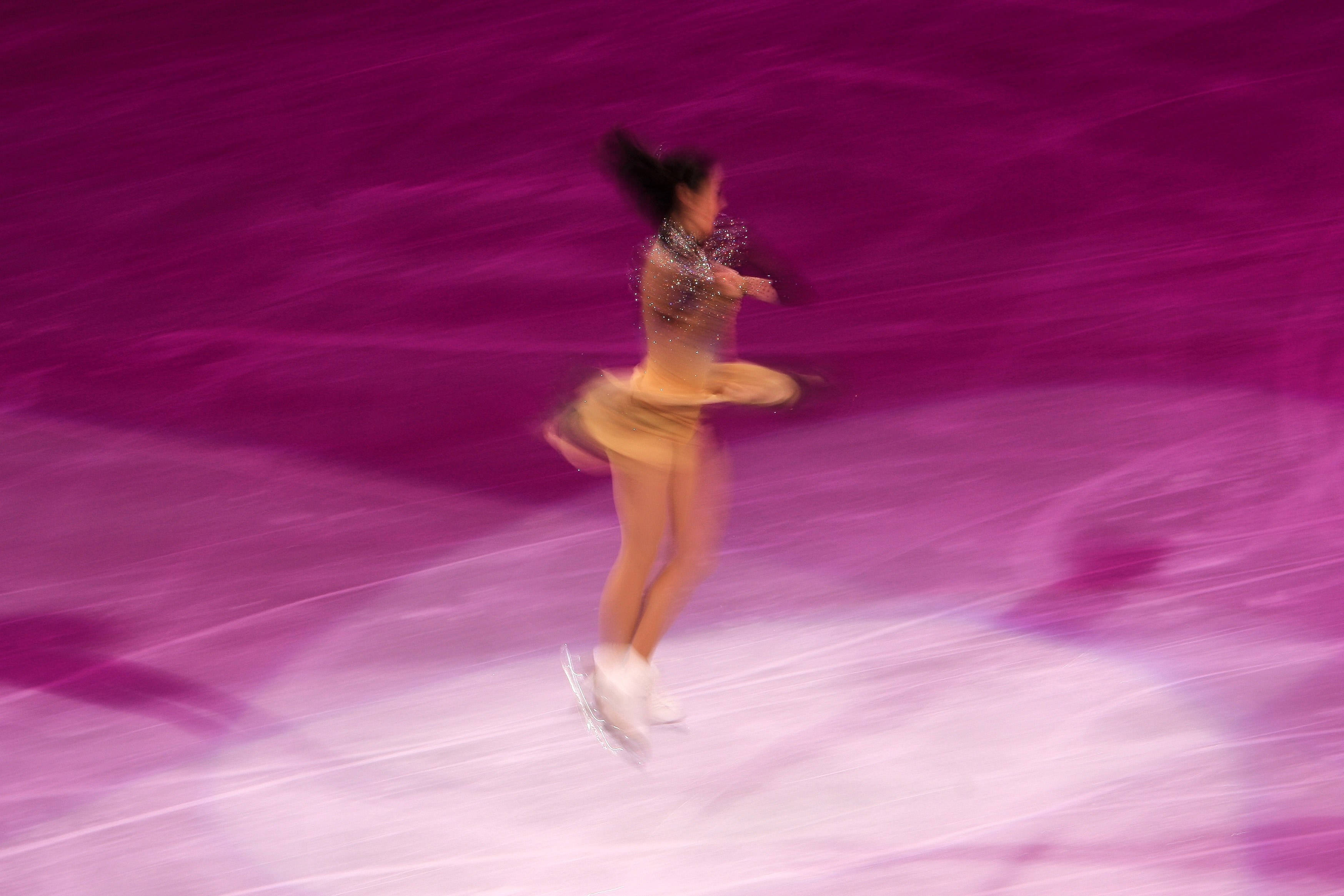 girl ice skating, exquisite movement, vibrant magenta ice rink, 2K Desktop Wallpaper