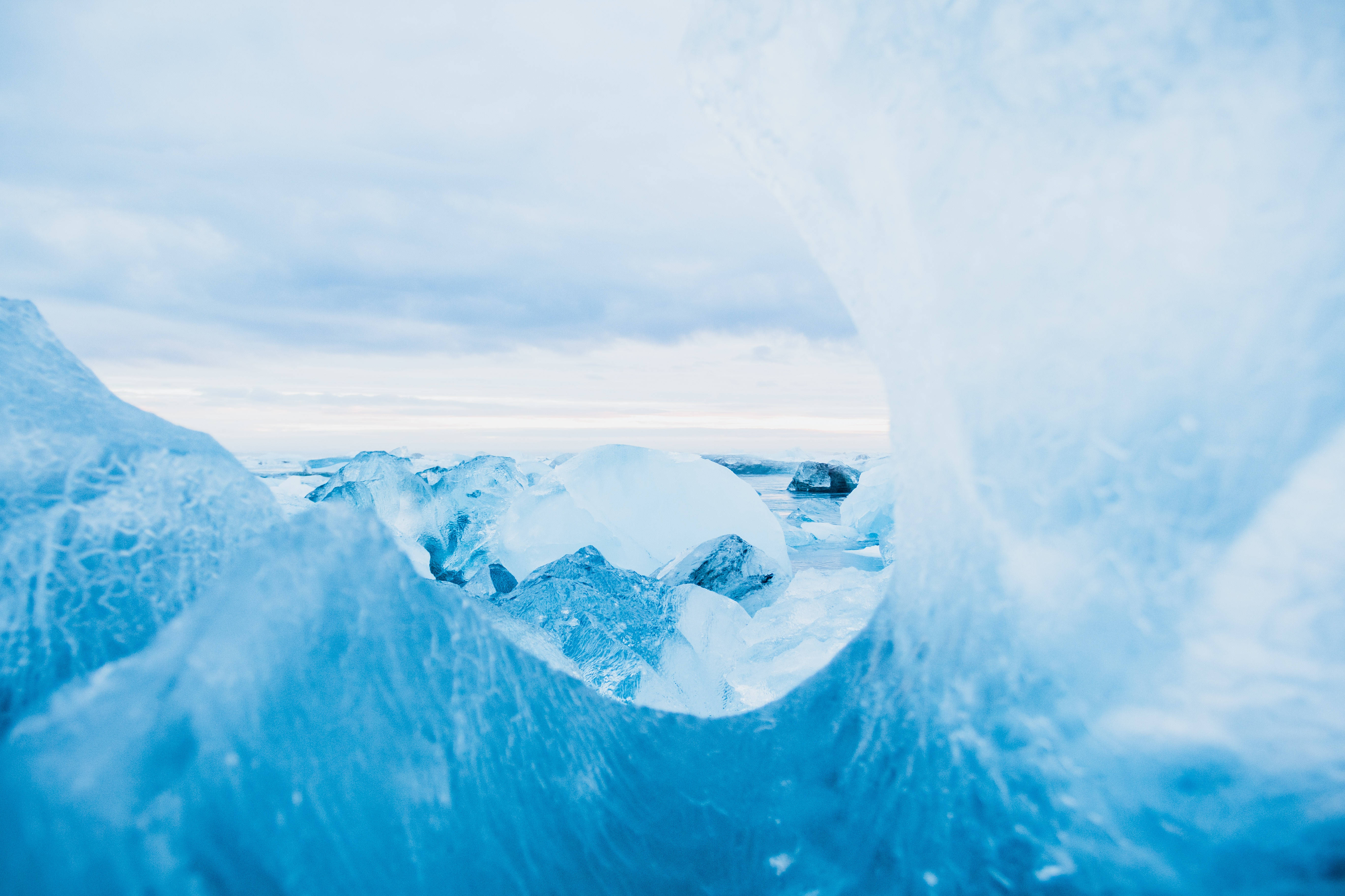 Ice Mountain, translucent blue ice arch, jagged glacier ice, 5K Desktop Wallpaper