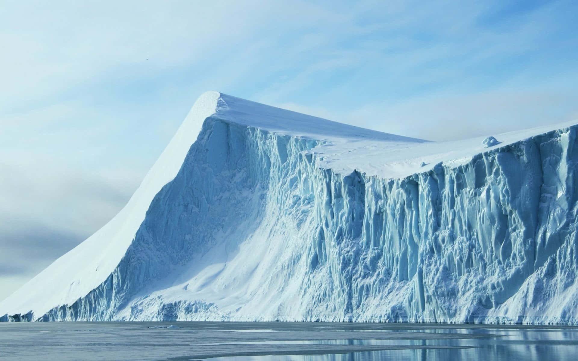 Iceberg, Arctic waters, pale blue sky, Full HD Desktop Wallpaper