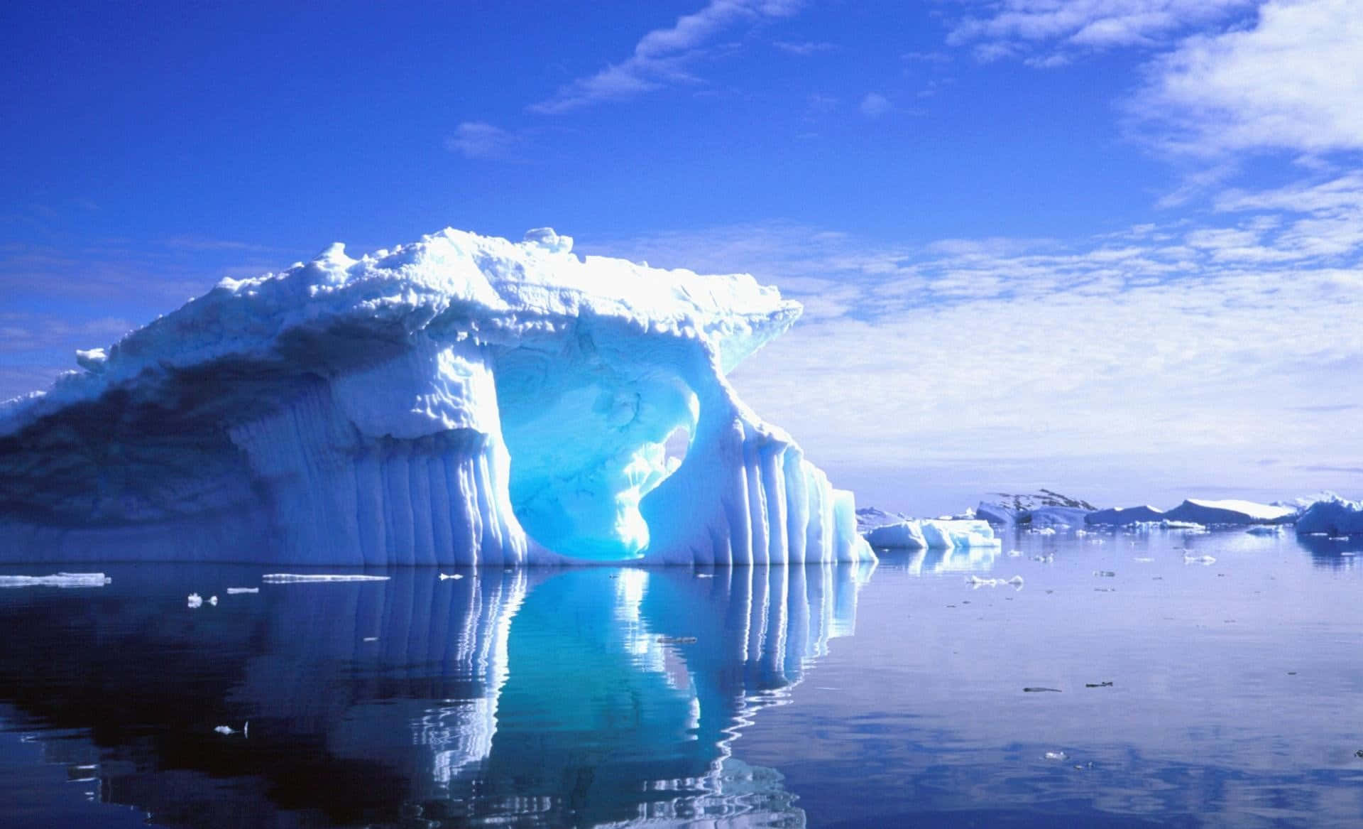 Iceberg, glowing blue arch, calm waters, Full HD Desktop Wallpaper