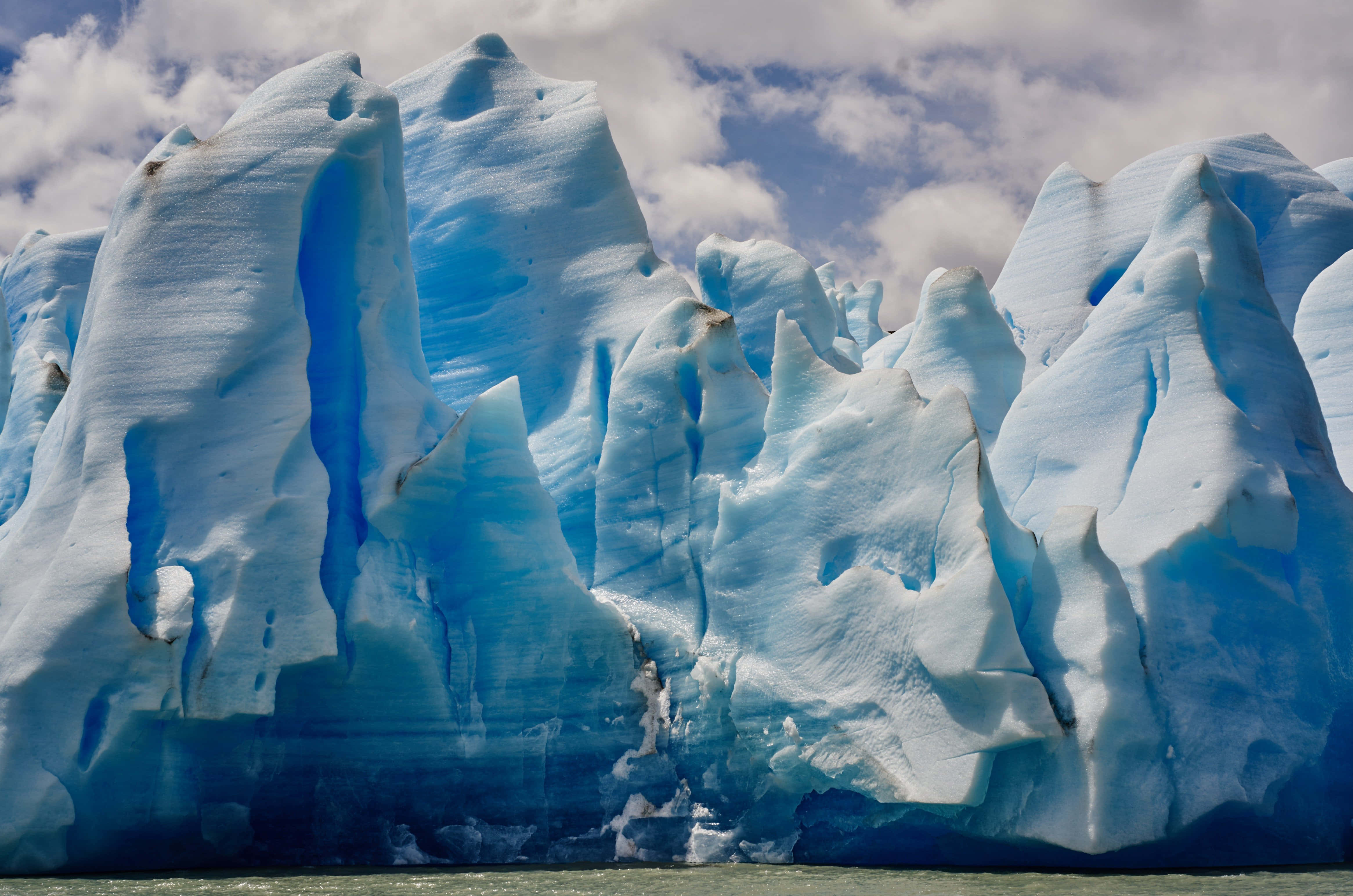 Iceberg, blue-white ice, calm waters, 4K Desktop Wallpaper