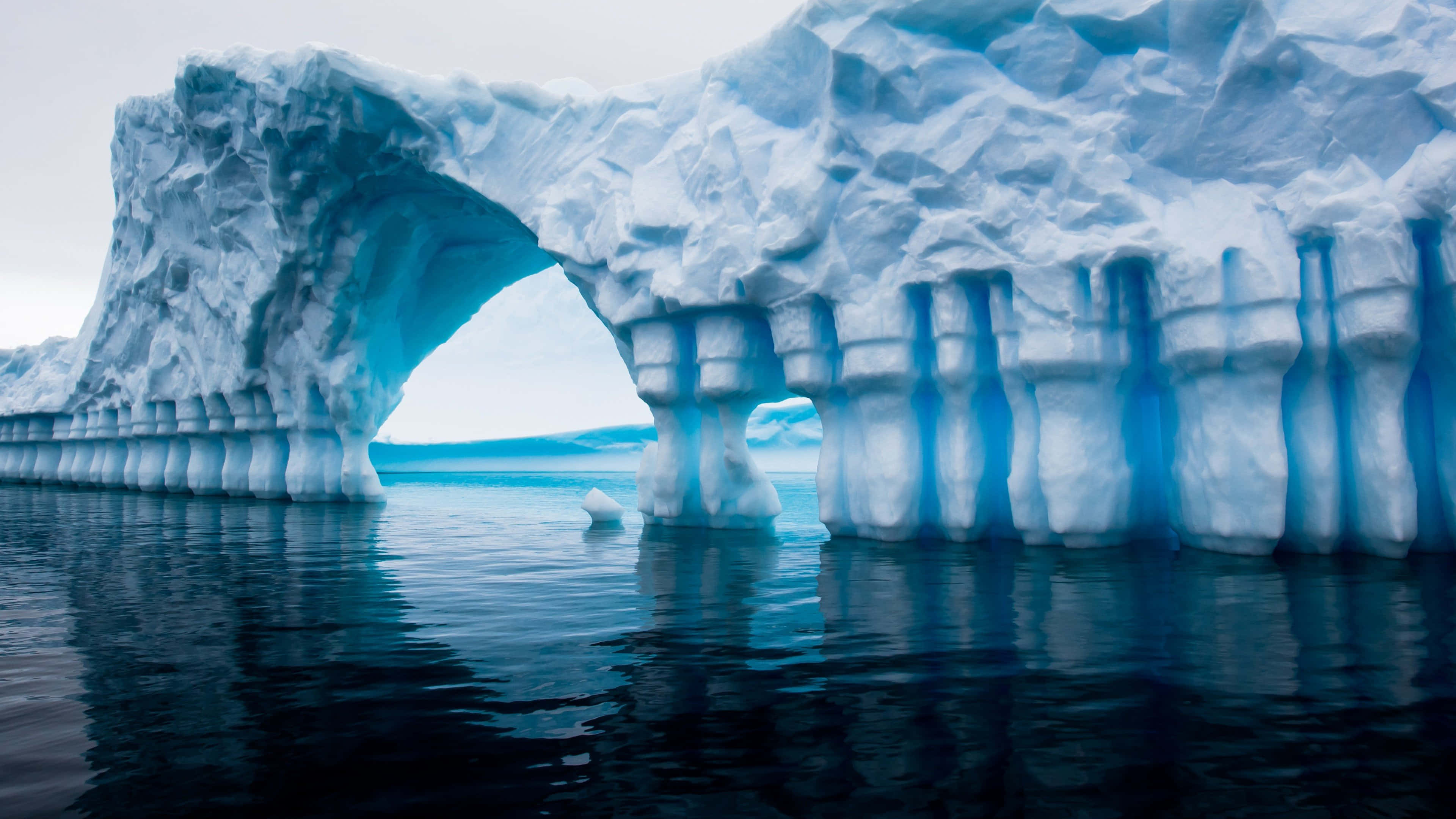 Iceberg, blue-white ice formations, calm waters, 4K Desktop Wallpaper