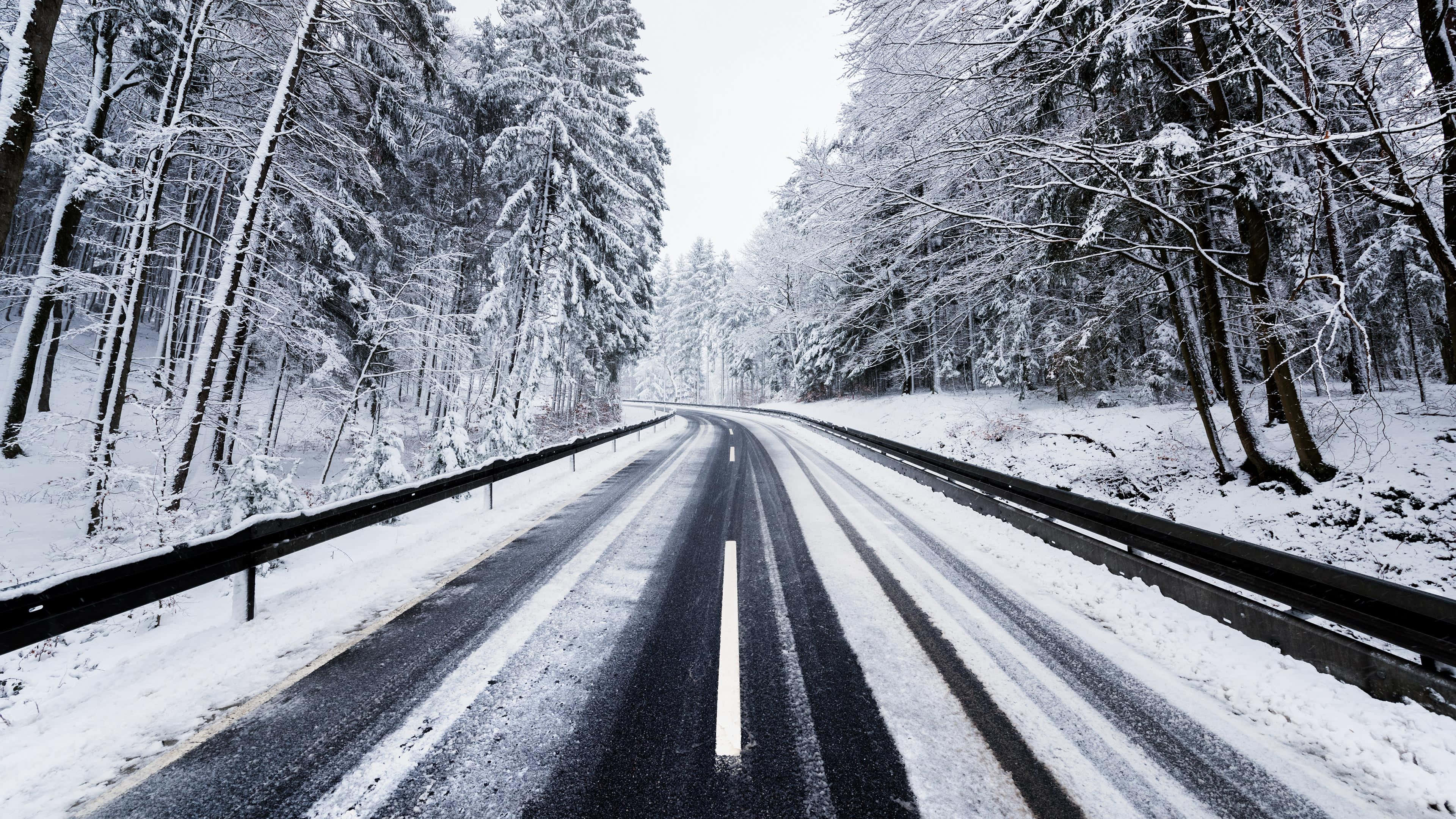 Icy Road, snow-dusted road, winter forest, 4K Desktop Wallpaper