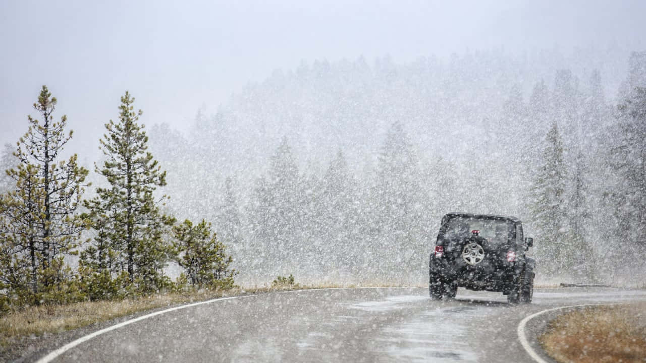 black SUV, heavy snowstorm, winding forest road, HD Desktop Wallpaper