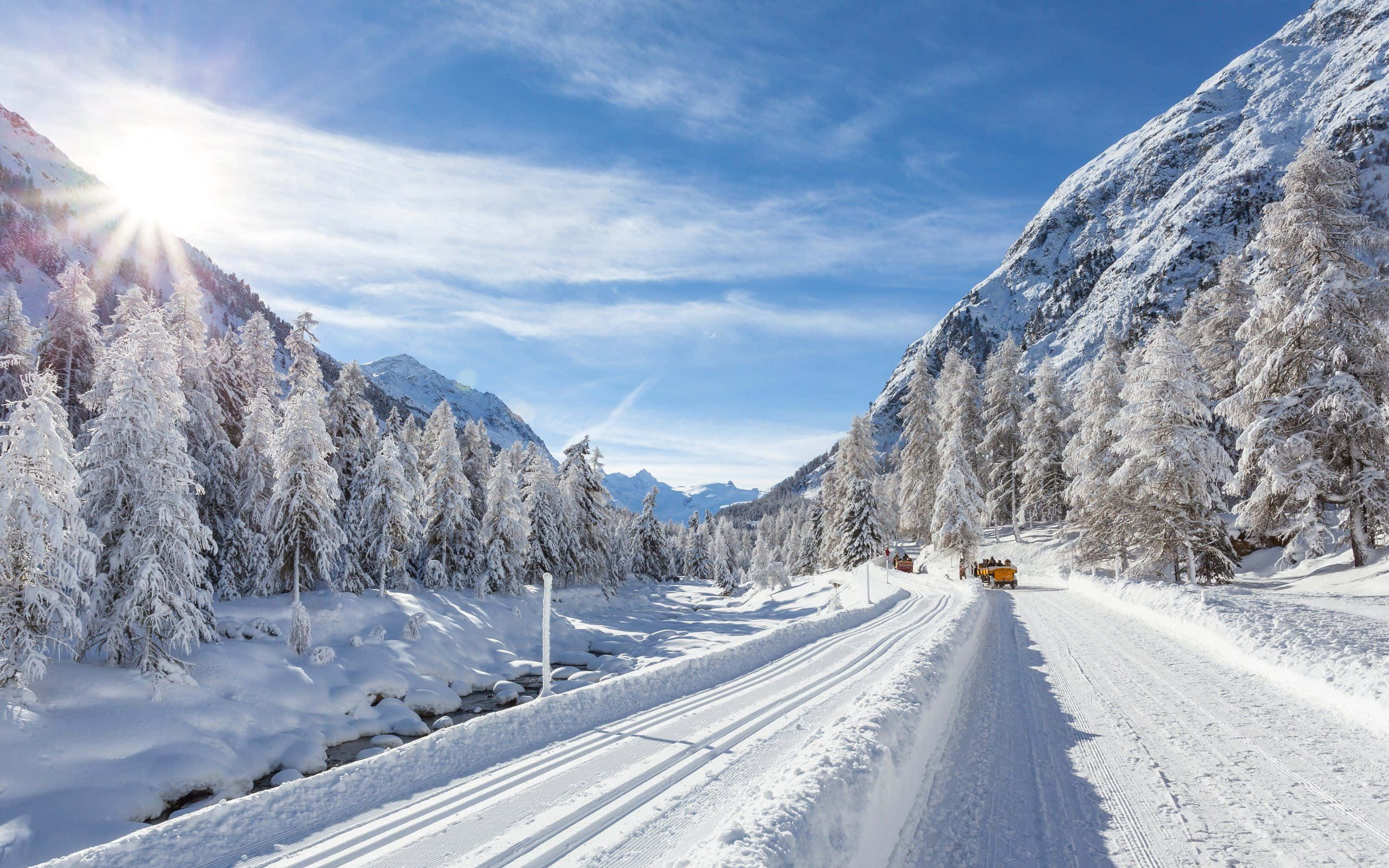 Icy Road, snowy mountain road, snow-covered pine forests, 2K Desktop Wallpaper