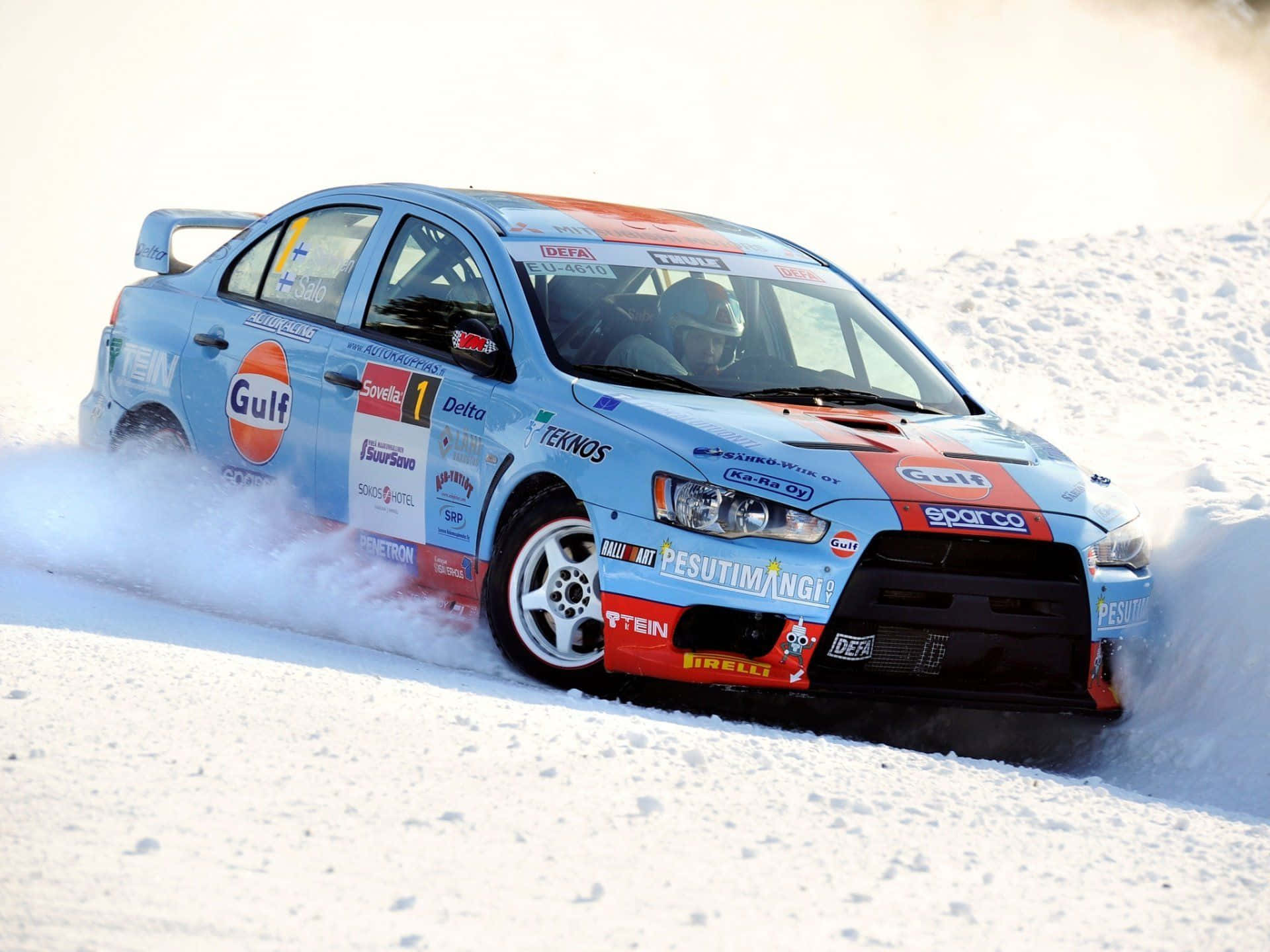 blue and orange rally car, icy terrain, bright snowy landscape, Full HD Desktop Wallpaper