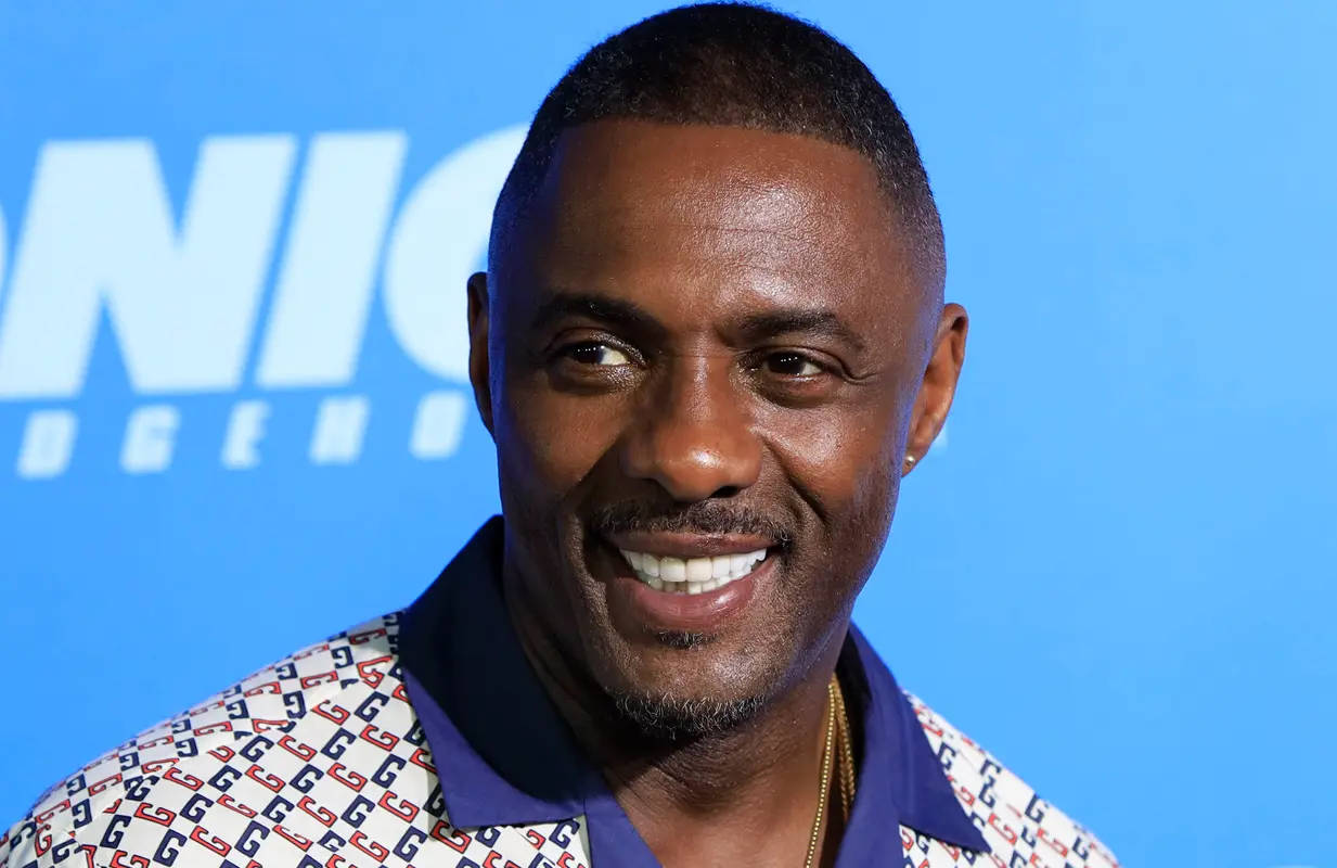 Idris Elba, printed polo shirt, bright blue background, SD Desktop Wallpaper